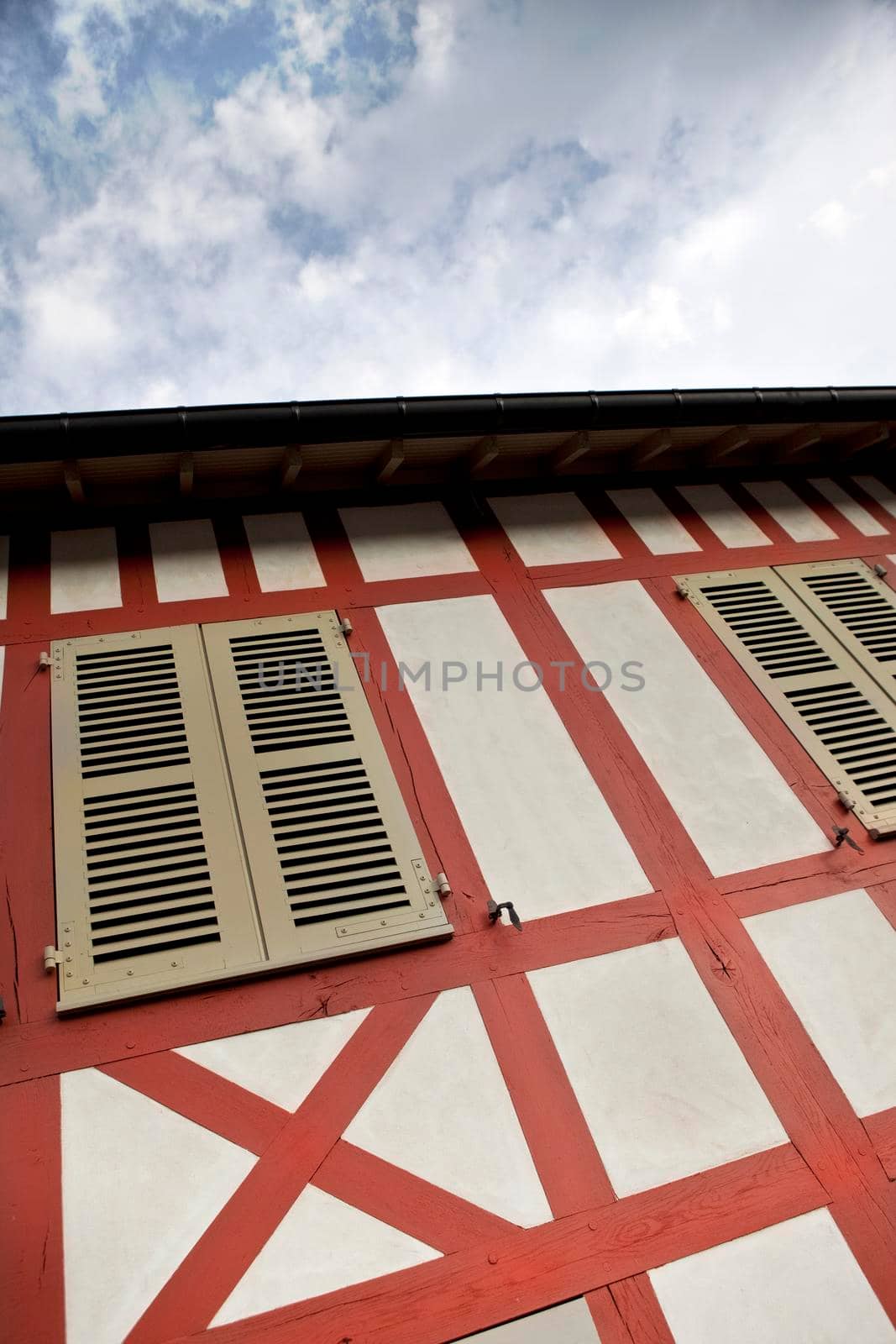 Facade of an old timbered house in Normandy, France