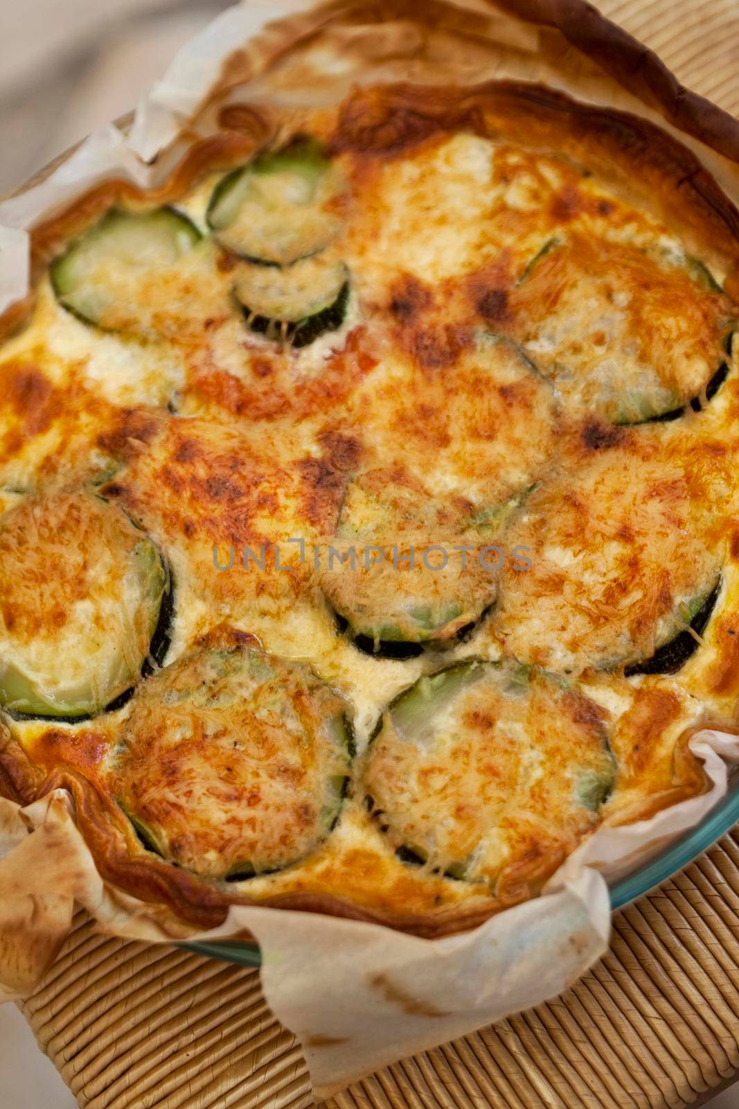 Close up of a grilled zucchini pie in a kitchen