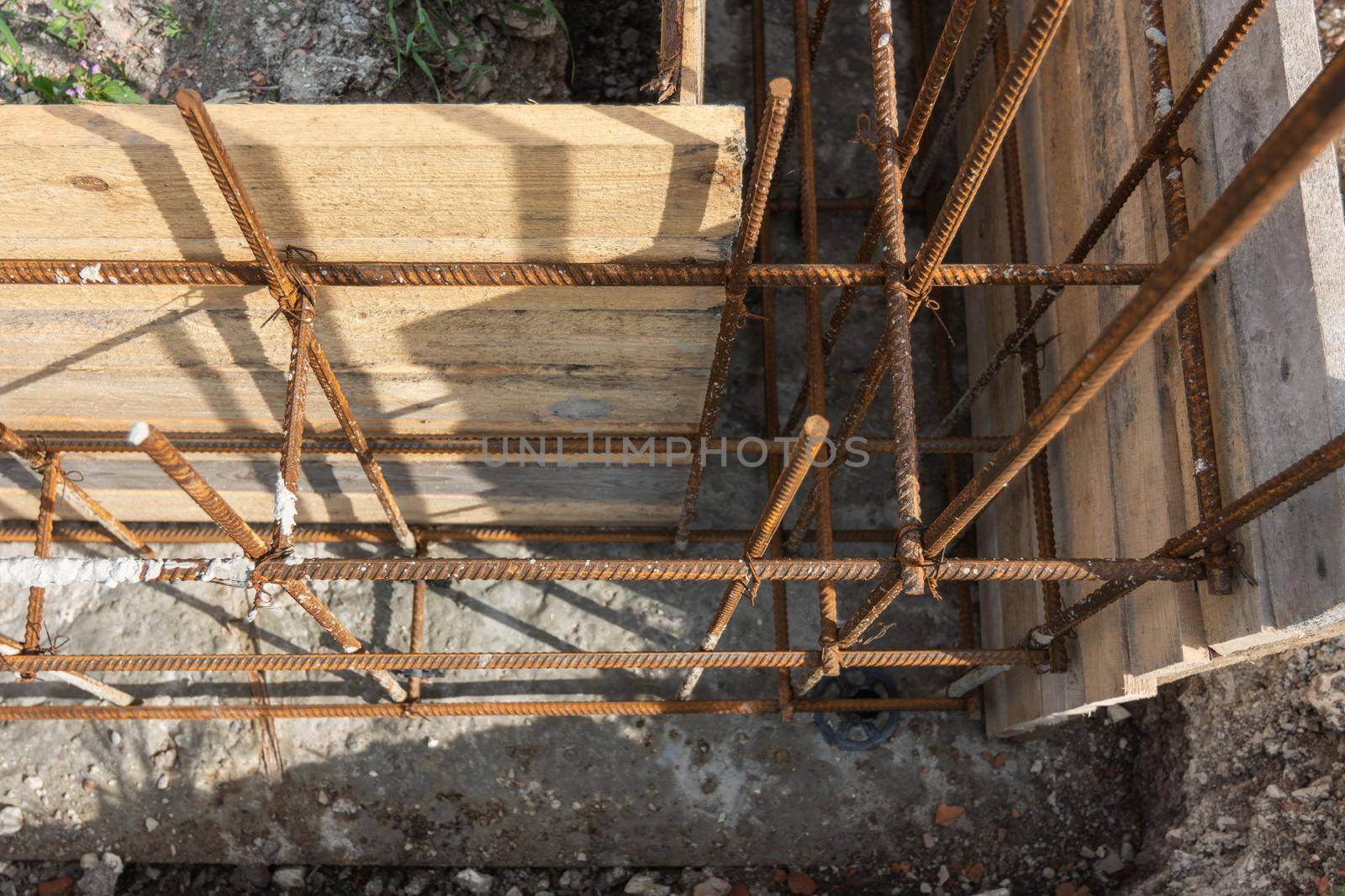 Tied rebar and mounted formwork close-up, top view