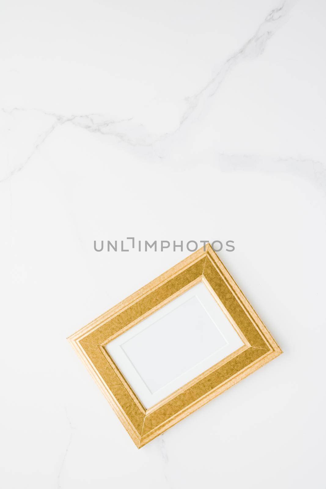 golden photo frame on marble, flatlay mockup - decor and mockup flatlay concept by Anneleven
