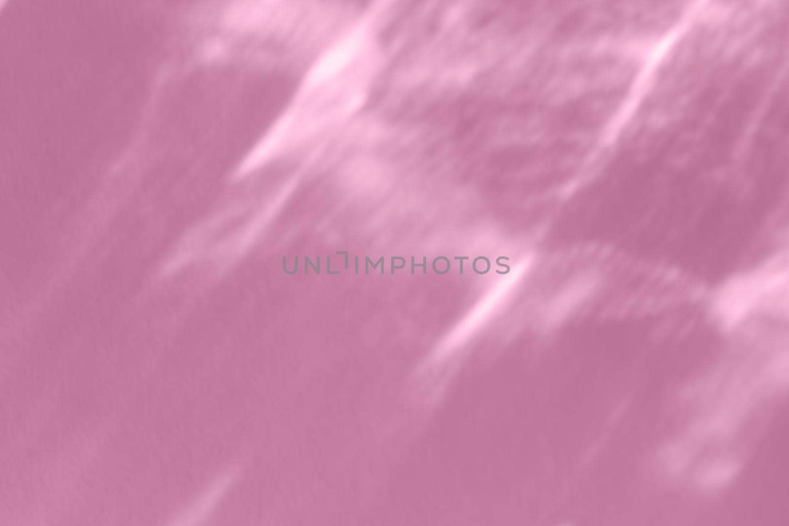 Caustic effect light refraction on pink wall overlay photo mockup, blurred sun rays refracting through glass prism with shadow. Abstract natural light refraction silhouette on water surface by photolime