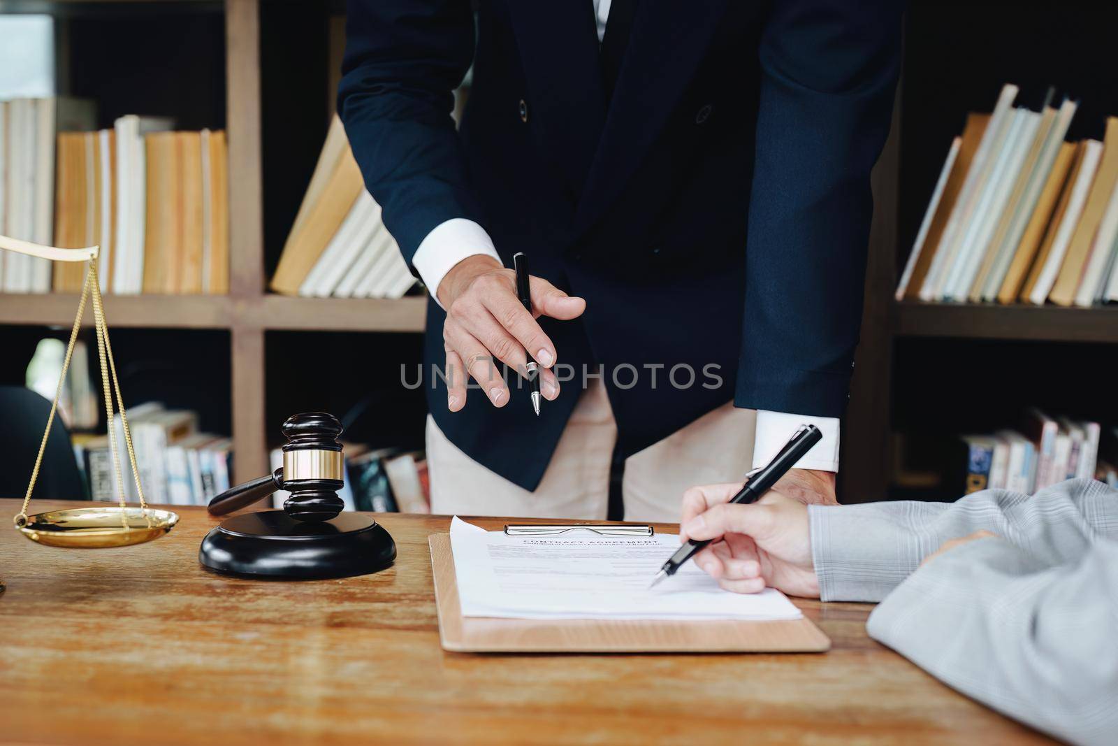 Discussing legal matters and signing important documents by Manastrong