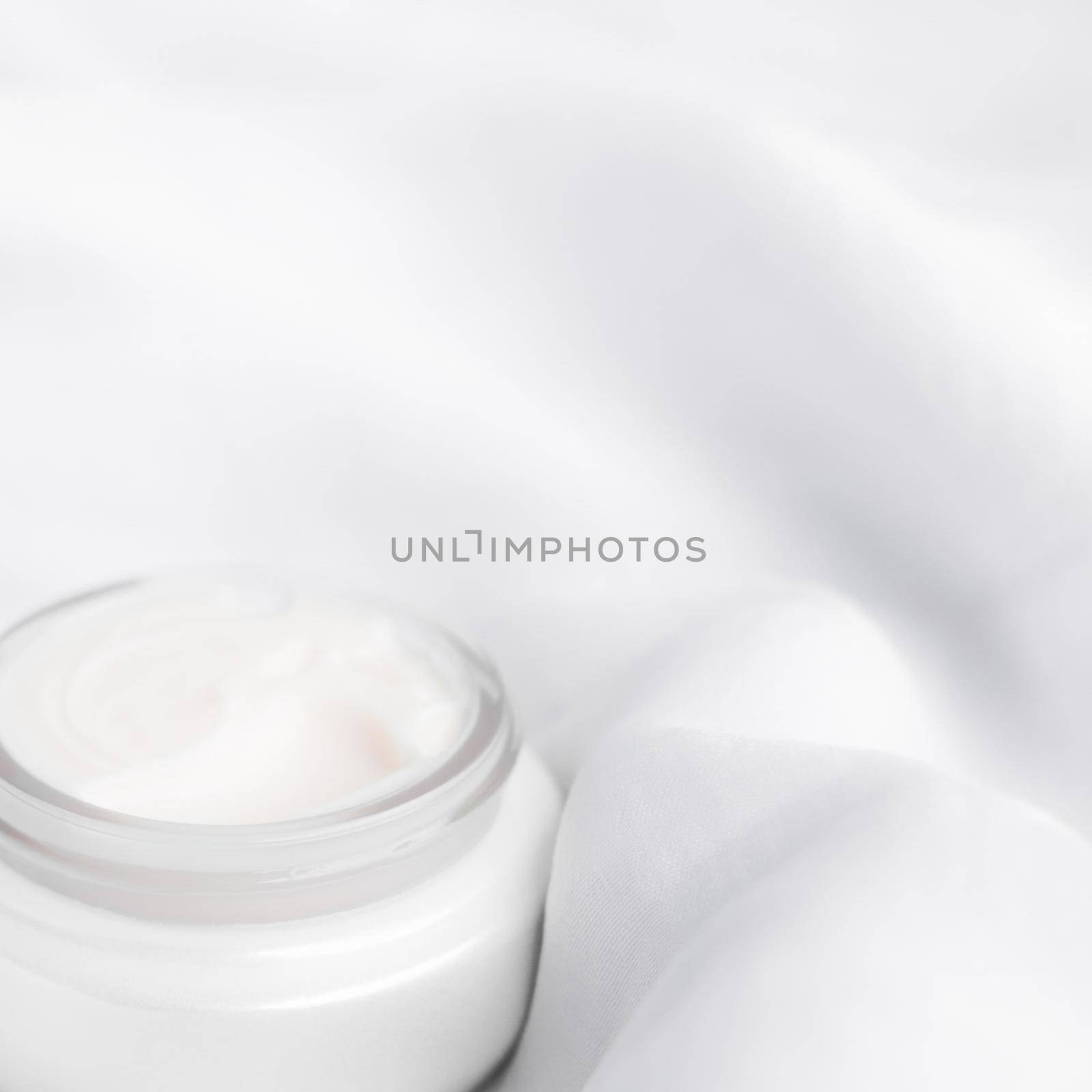 luxury face cream on soft silk - anti-aging, cosmetic and beauty styled concept, elegant visuals