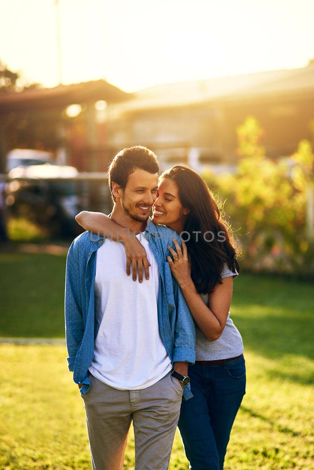 You are my greatest joy. an affectionate young couple bonding together outdoors