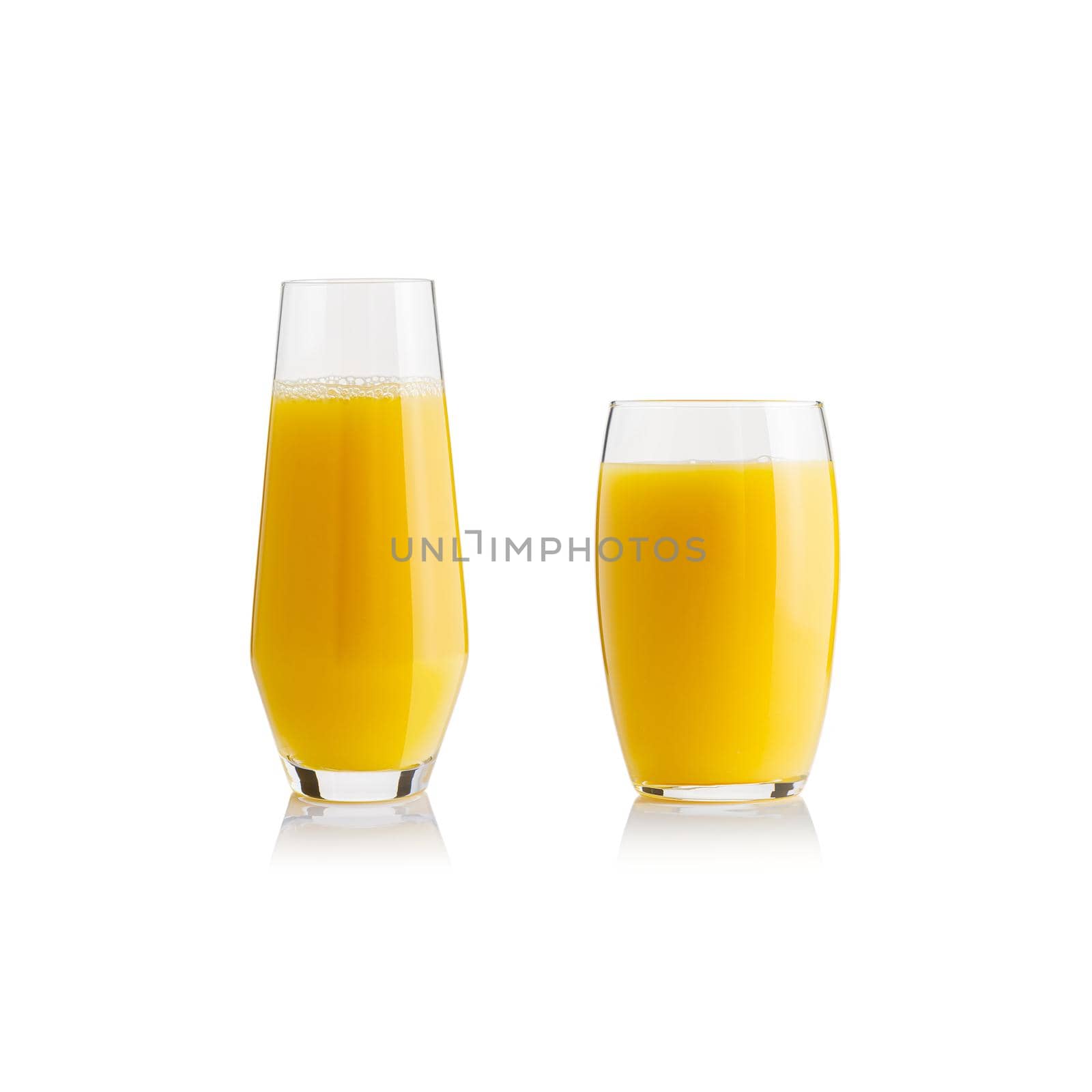 Collection of orange juice in different glasses . eparate clipping paths for each glass. Set of glasses with tropical orange juice