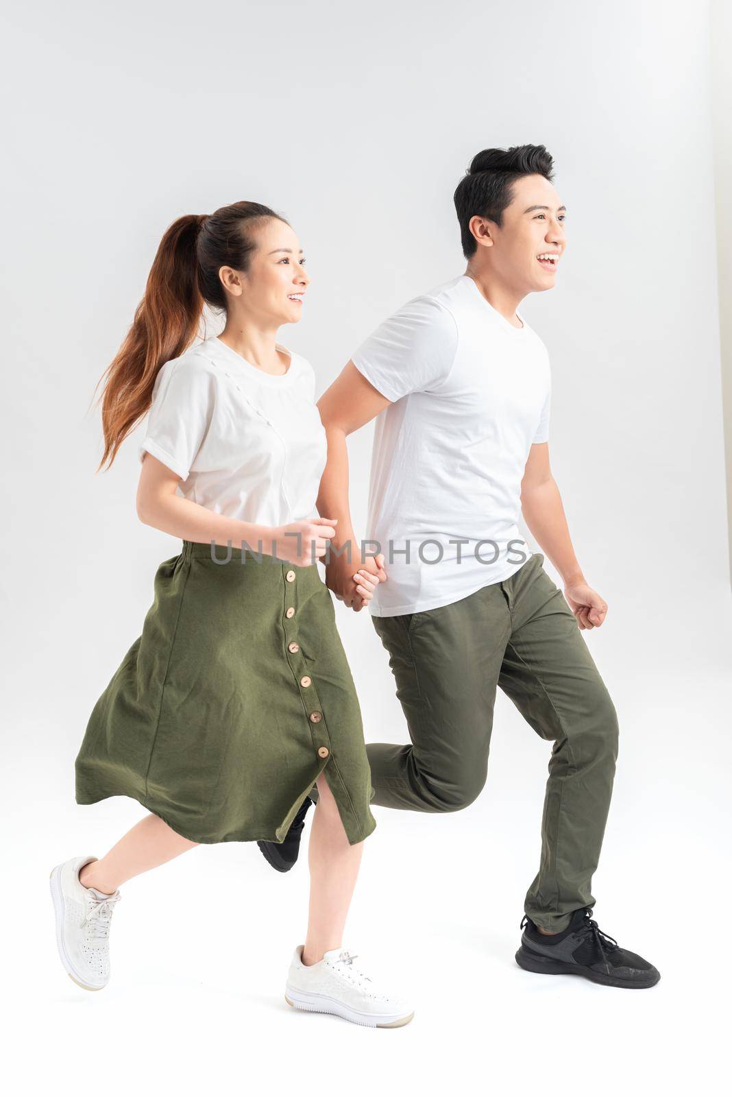 in full growth. young couple walking together