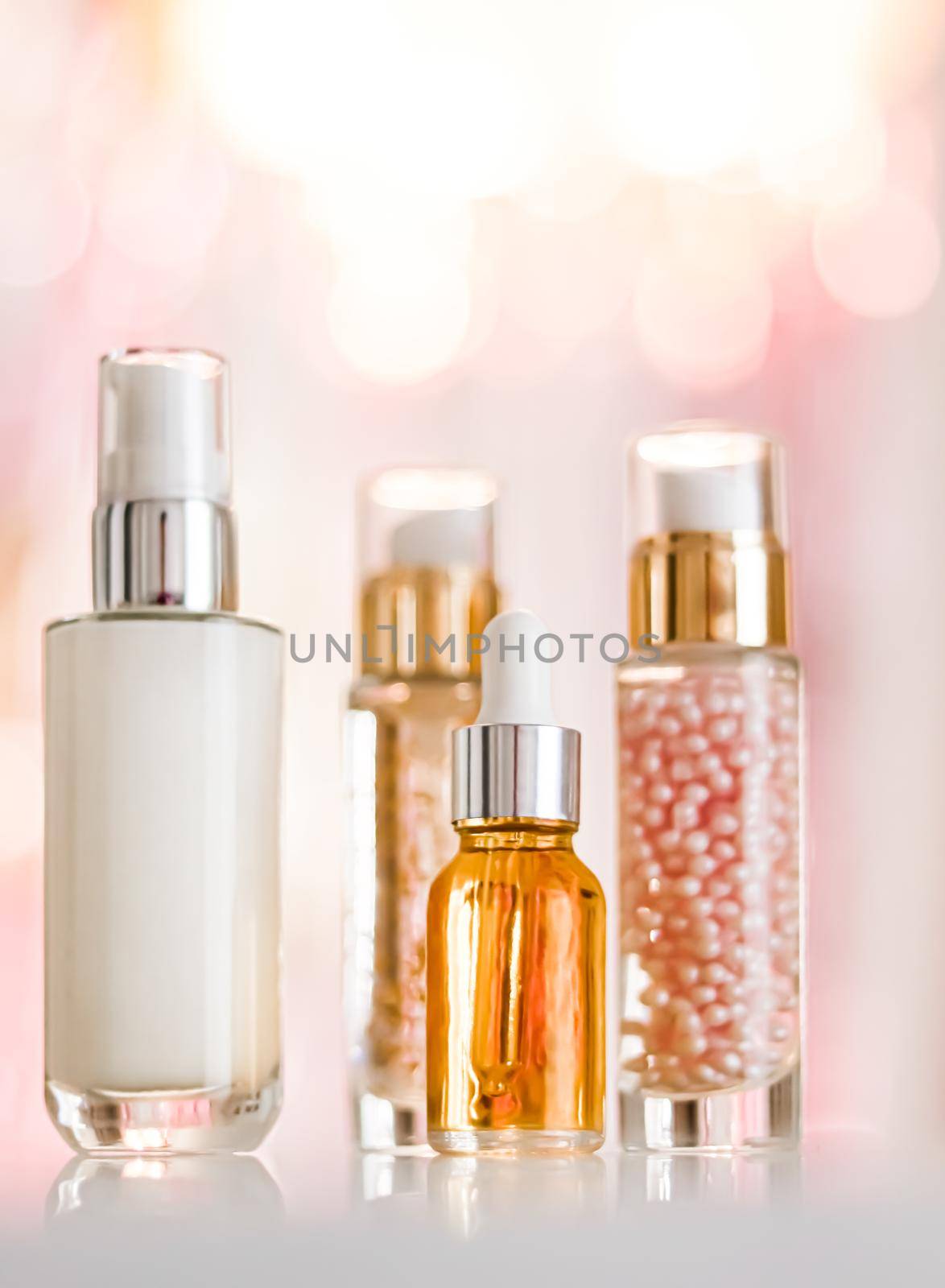 Skincare cosmetics products on glamour background, glass bottles with serum, oil, face cream moisturiser, facial lotion, cleanser as skin care cosmetic set on glossy marble, body care routine and luxury beauty brand by Anneleven