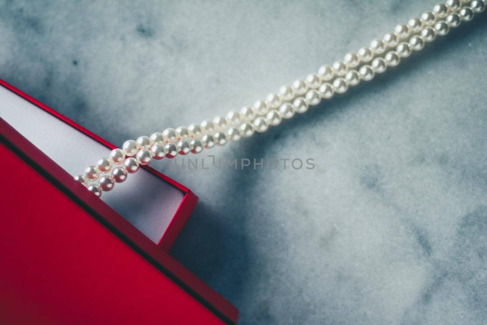 wonderful pearls in a red gift box, luxe present - jewellery and luxury gift for her styled concept, elegant visuals