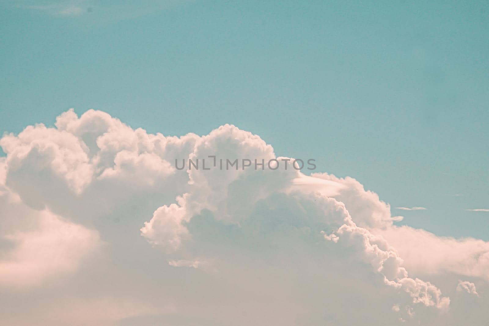 Beautiful white fluffy clouds sky background abstract season and weather.