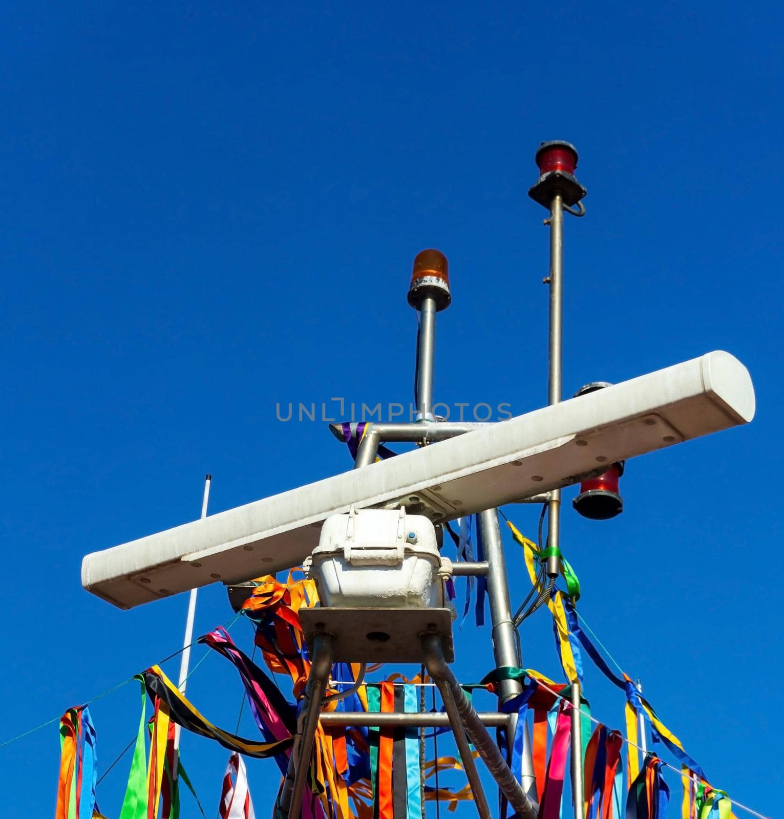 Navigation equipment on top of the decorated boat close up
