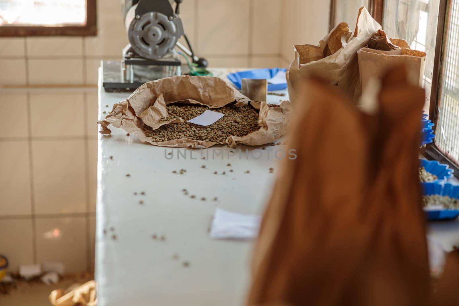 Spilled coffee from a paper bag in production