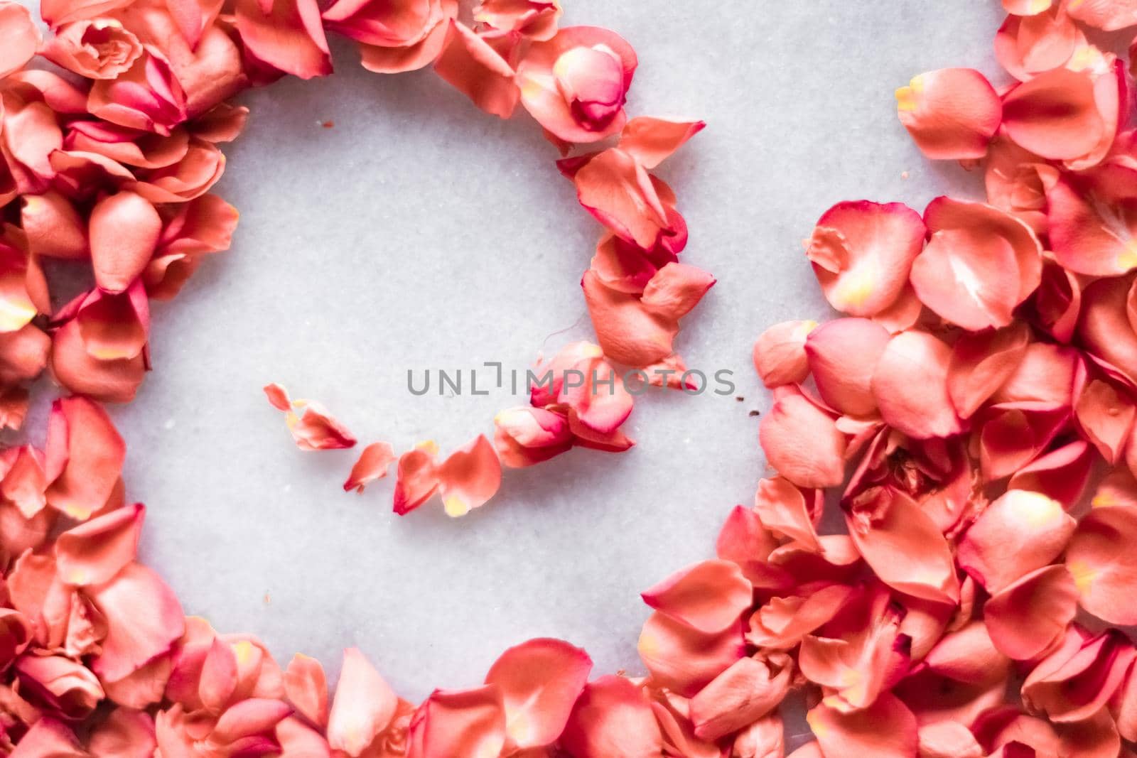 coral rose petals on marble, color of the year - flower backgrounds and holidays styled concept