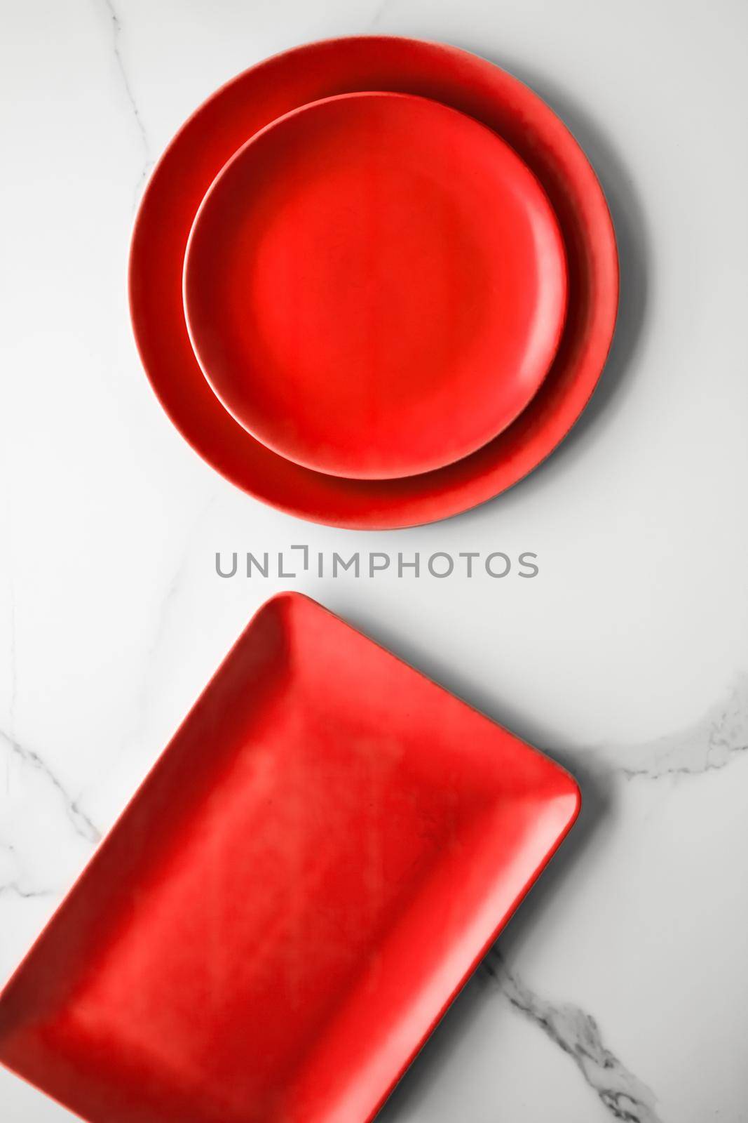 empty red plate on marble - recipe and restaurant mockup flatlay styled concept