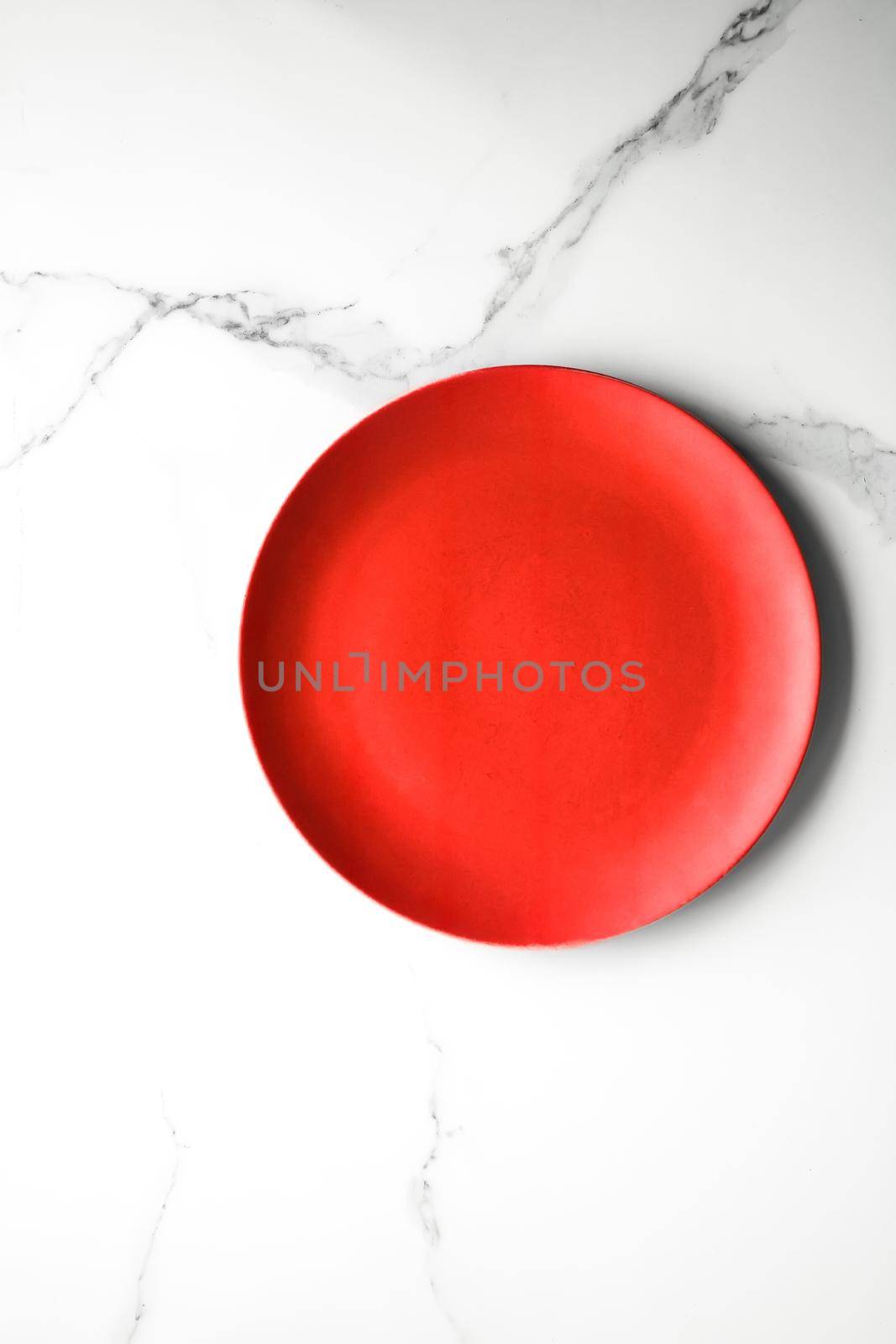 empty red plate on marble - recipe and restaurant mockup flatlay styled concept