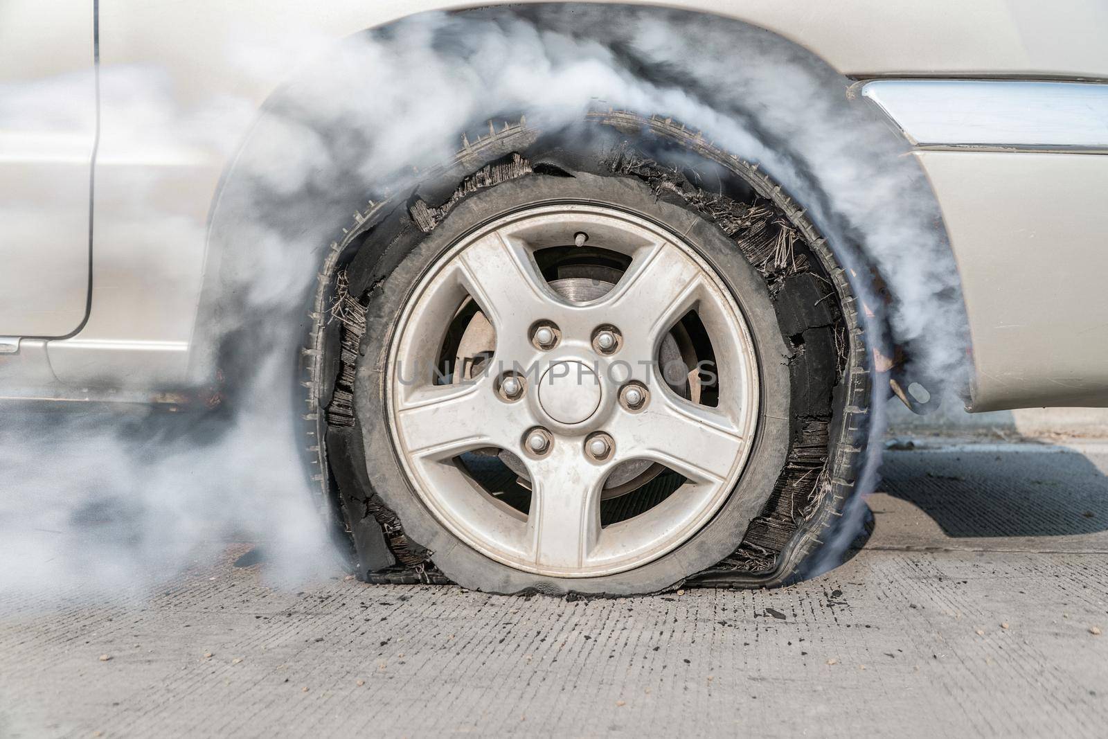 burst tire on the road