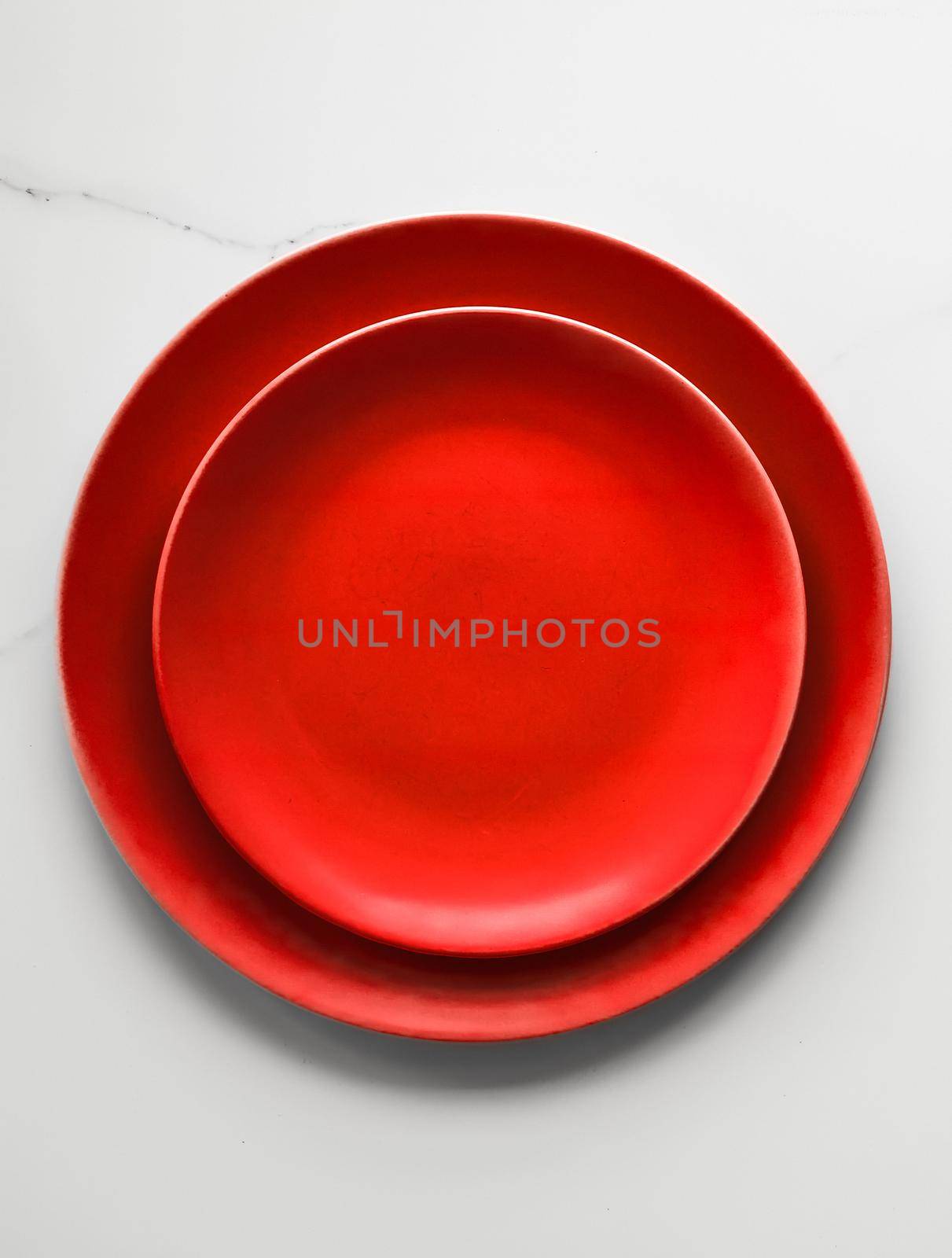 empty red plate on marble - recipe and restaurant mockup flatlay styled concept