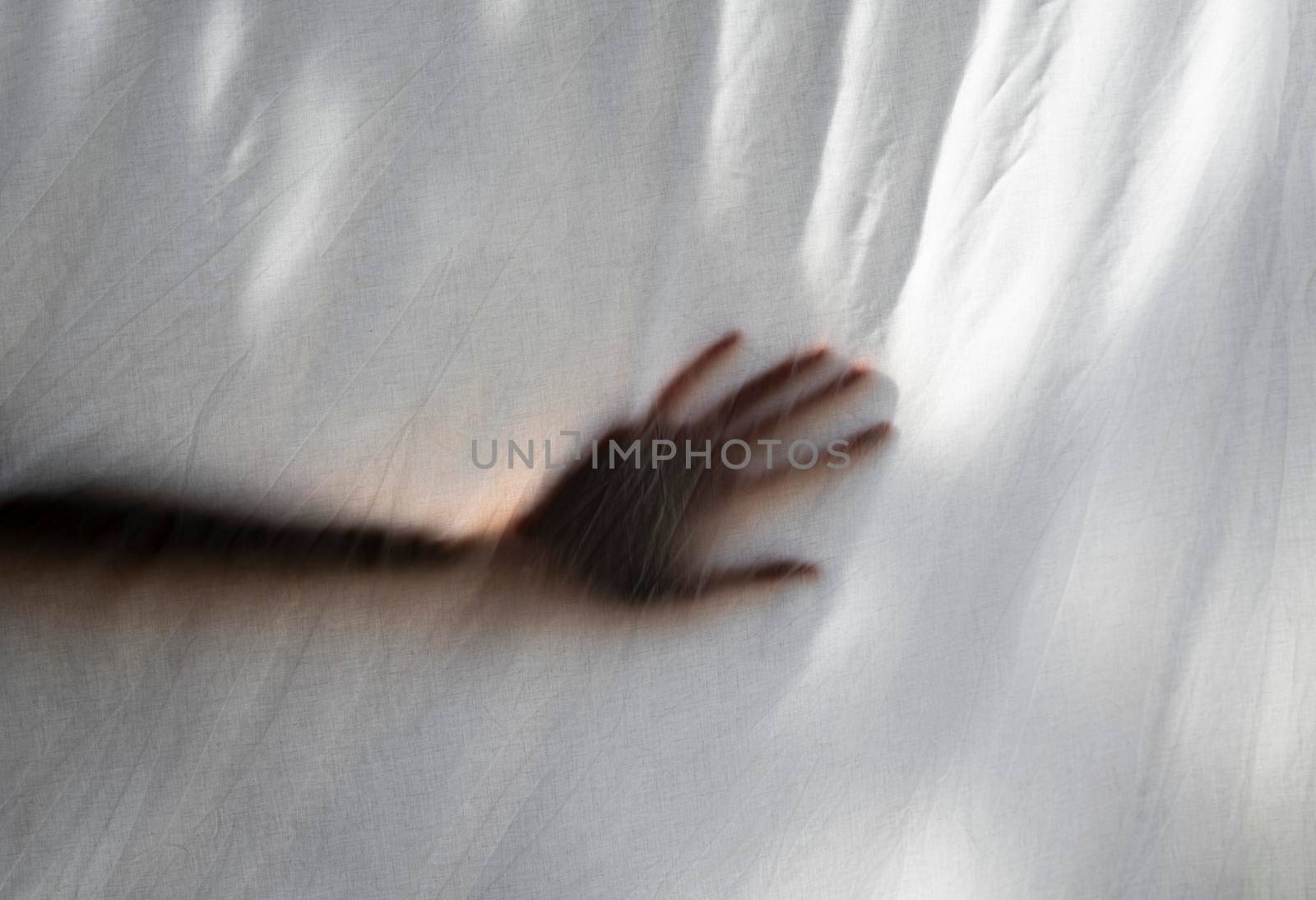Hand shade behind white sheet by SimmiSimons