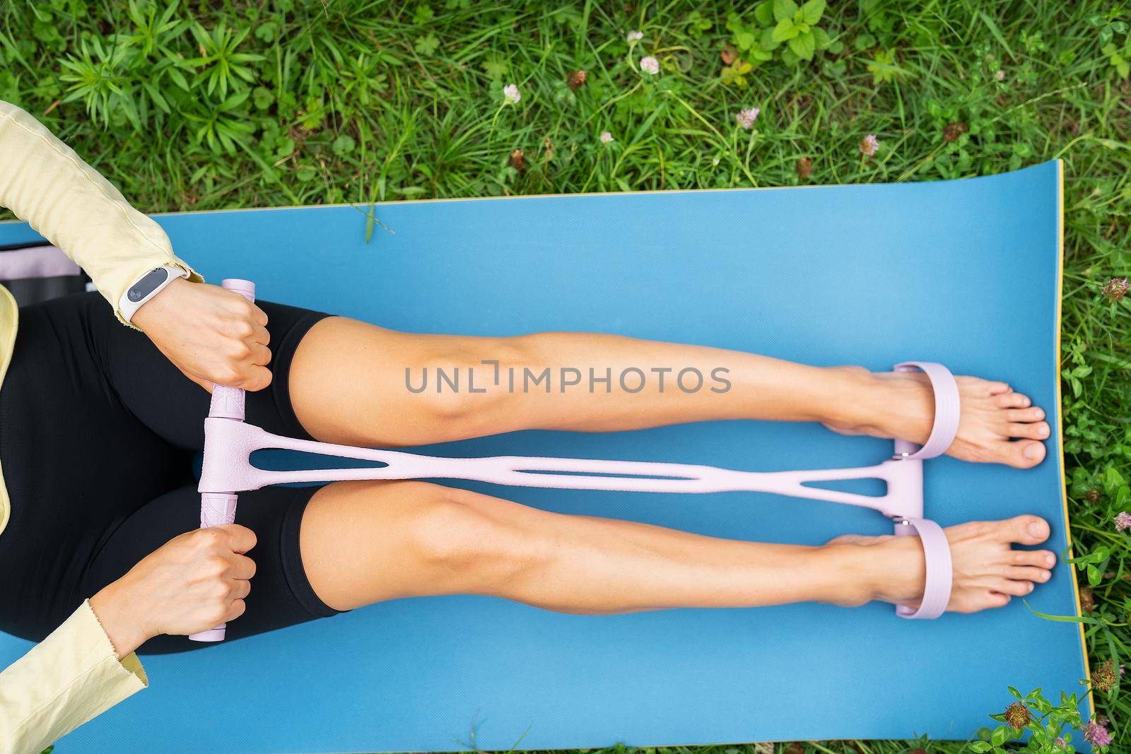 Multiracial women doing yoga exercise with social distance for coronavirus outbreak at park outdoor - Healthy lifestyle and sport concept by sfinks