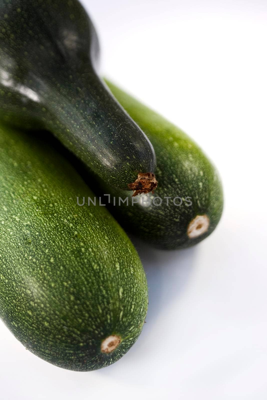 Close up of green zucchini on a table