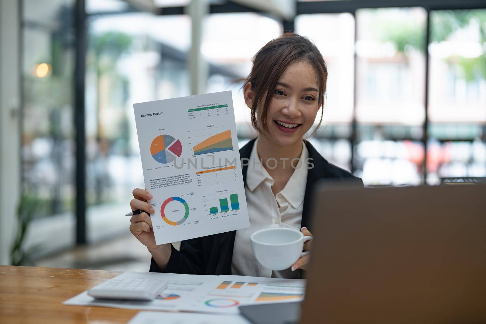 business woman presentation about statistics graphic of selling and production by video conference