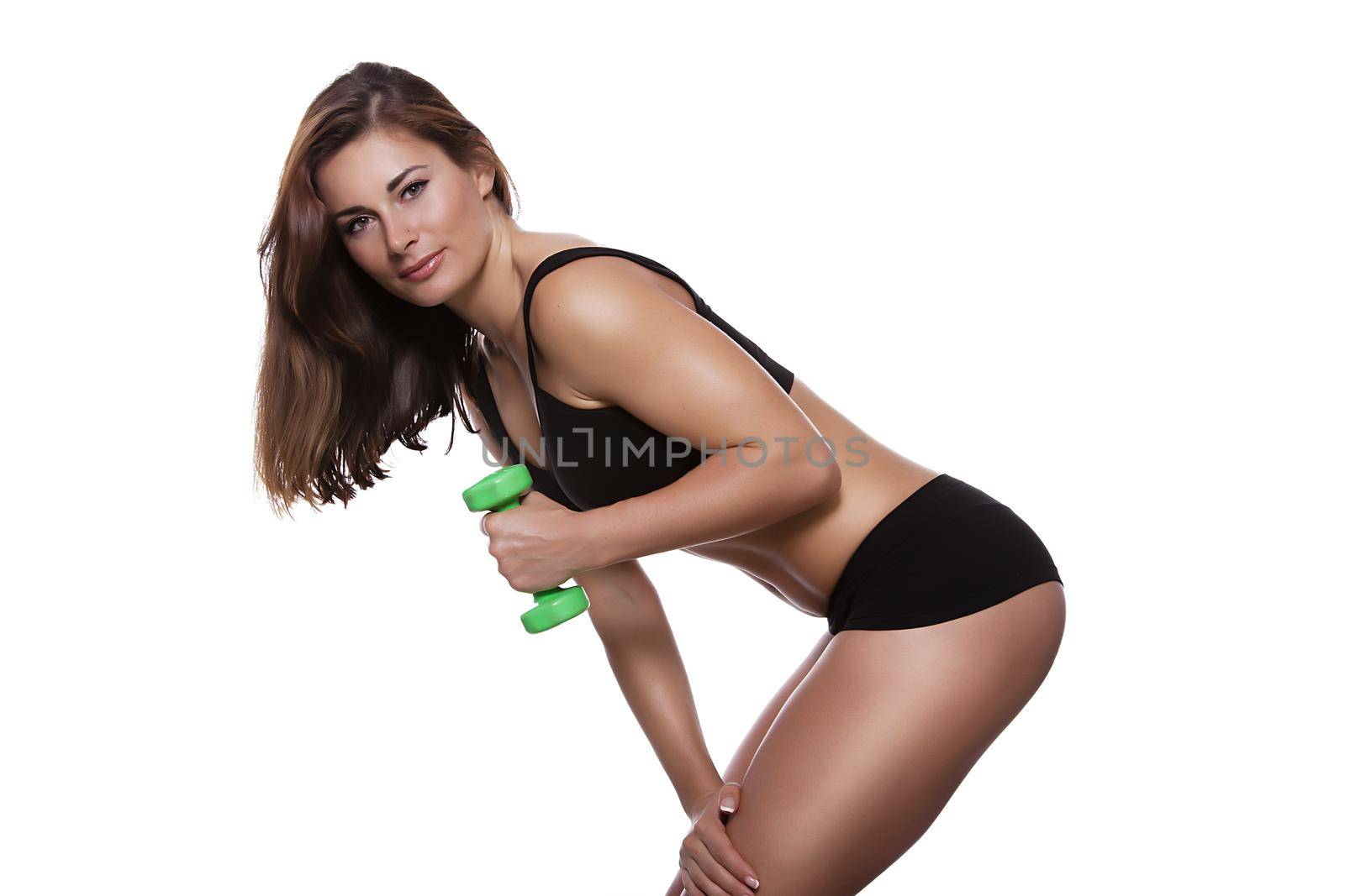 Fitness girl with dumbbells on a white background by studiodav