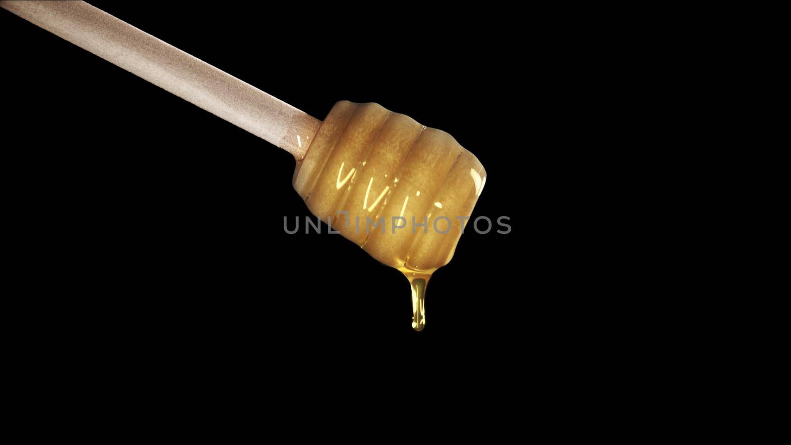 Honey dripping from honey dipper on black background 4k