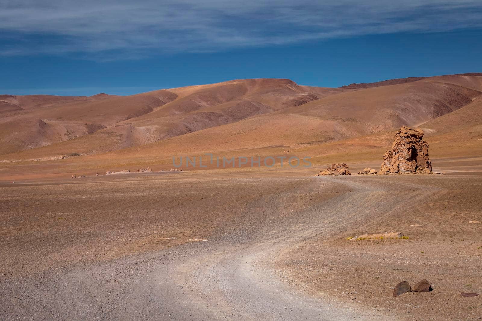 Country road in Atacama desert, volcanic arid landscape in Northern Chile border with Bolivia, South America