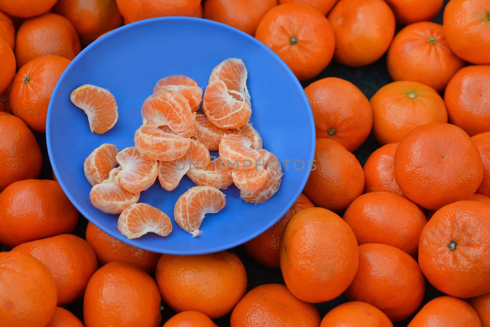Mandarins on the market Plate with mandarin