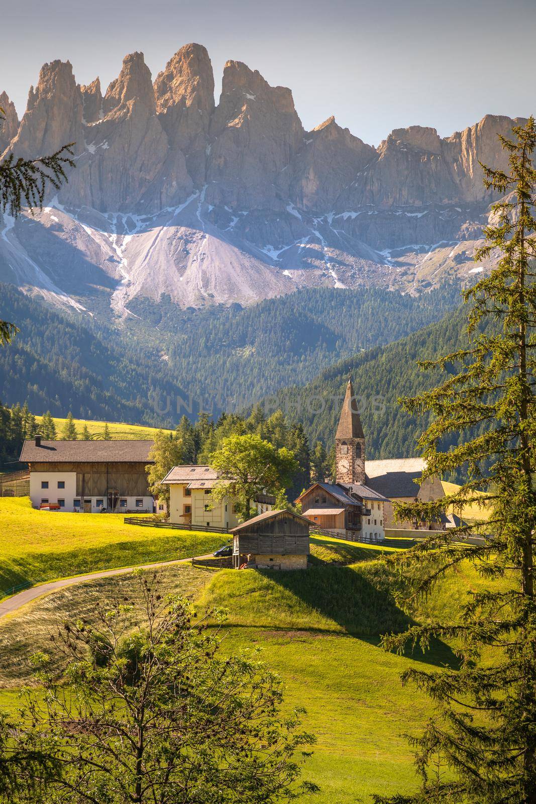 Idyllic St. Magdalena village with famous church in Val di Funes, Dolomites, Northern Italy