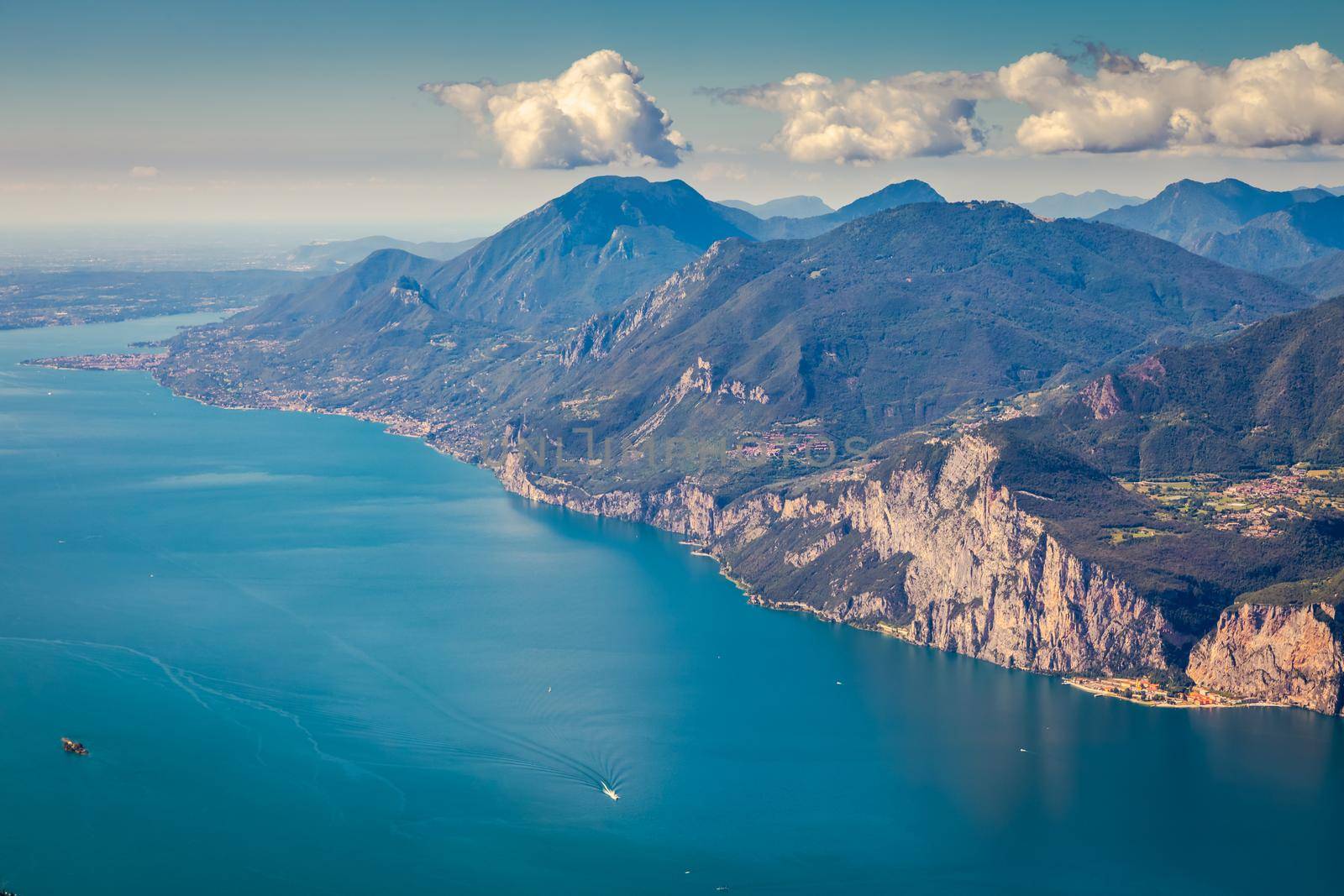 Above idyllic and turquoise Lake Garda from Monte Baldo, Malcesine, Northern Italy