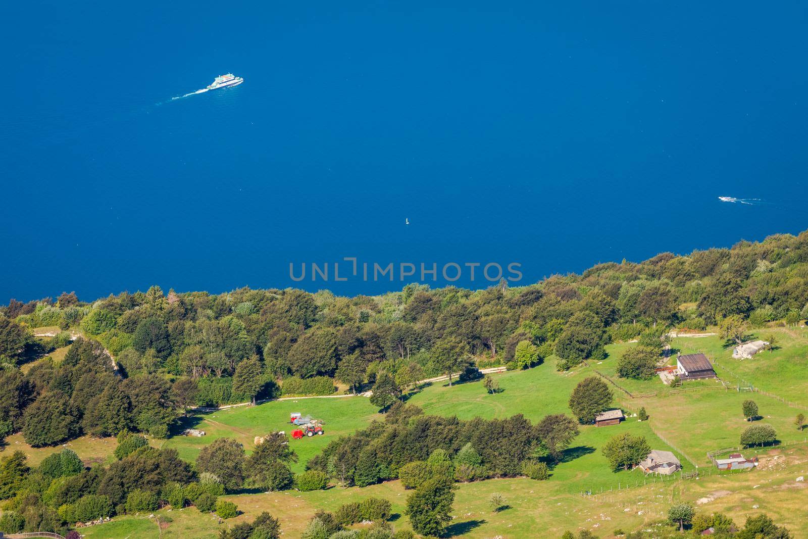 Above idyllic and turquoise Lake Garda from Monte Baldo, Malcesine, Northern Italy
