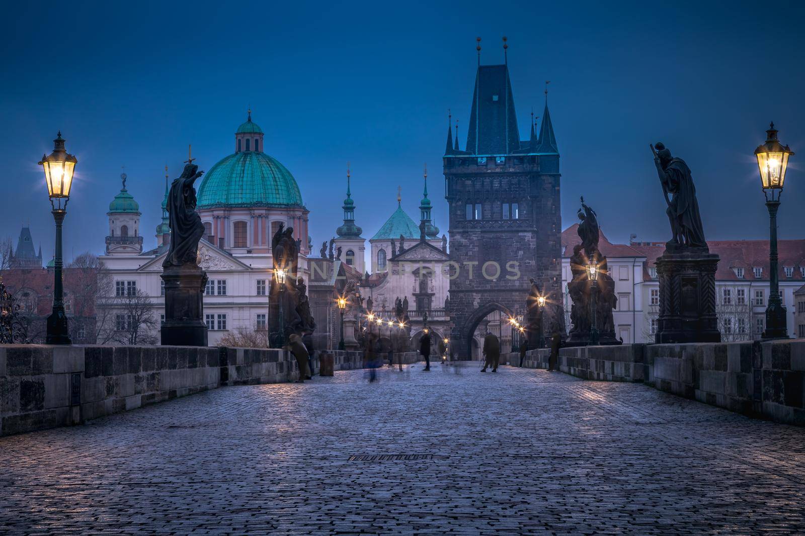 Charles bridge illuminated at night, Prague old town, Czech Republic