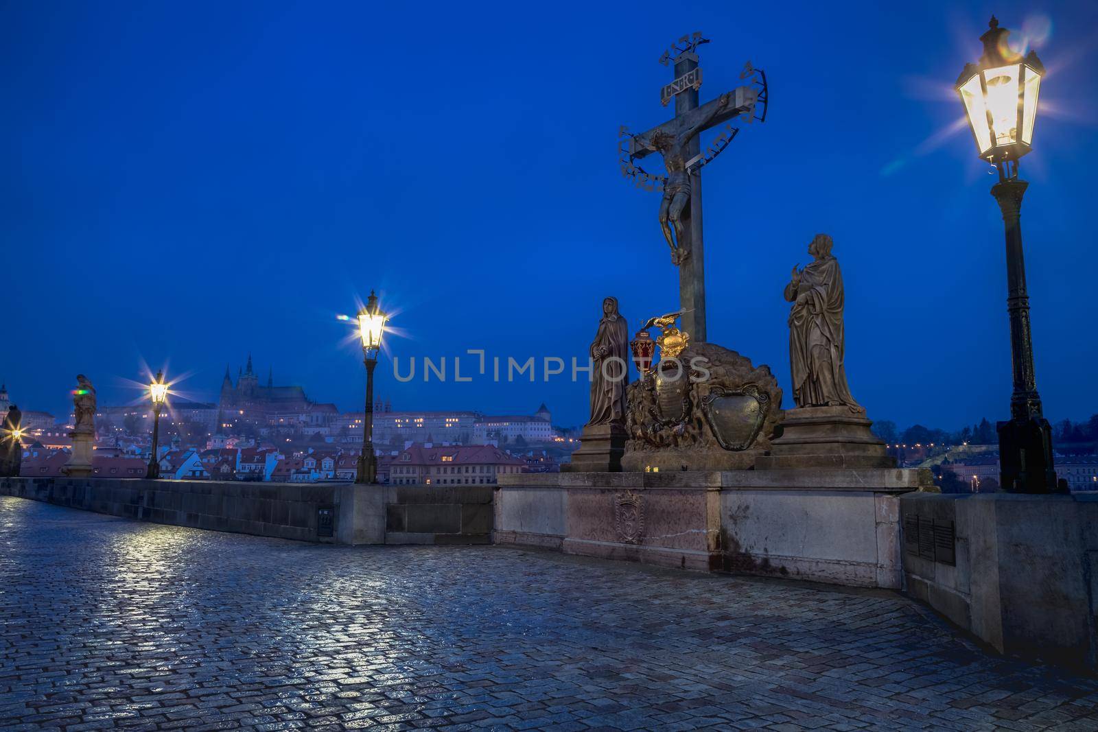 Charles bridge illuminated at night, Prague old town, Czech Republic