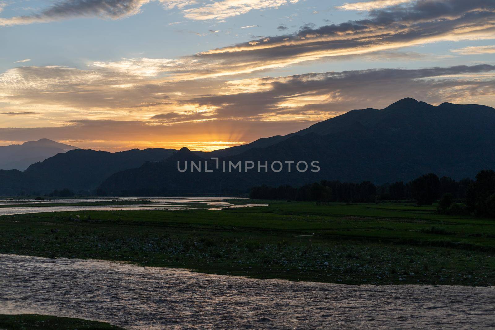 Sunset in Swat valley over a mountains and river