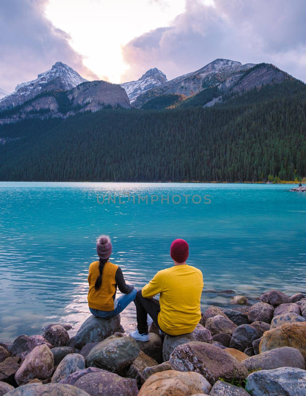 Lake Louise Canadian Rockies Banff national park, Beautiful autumn views Lake Louise in Banff National Park in the Rocky Mountains of Alberta Canada. young couple men and women visiting Lake Louise