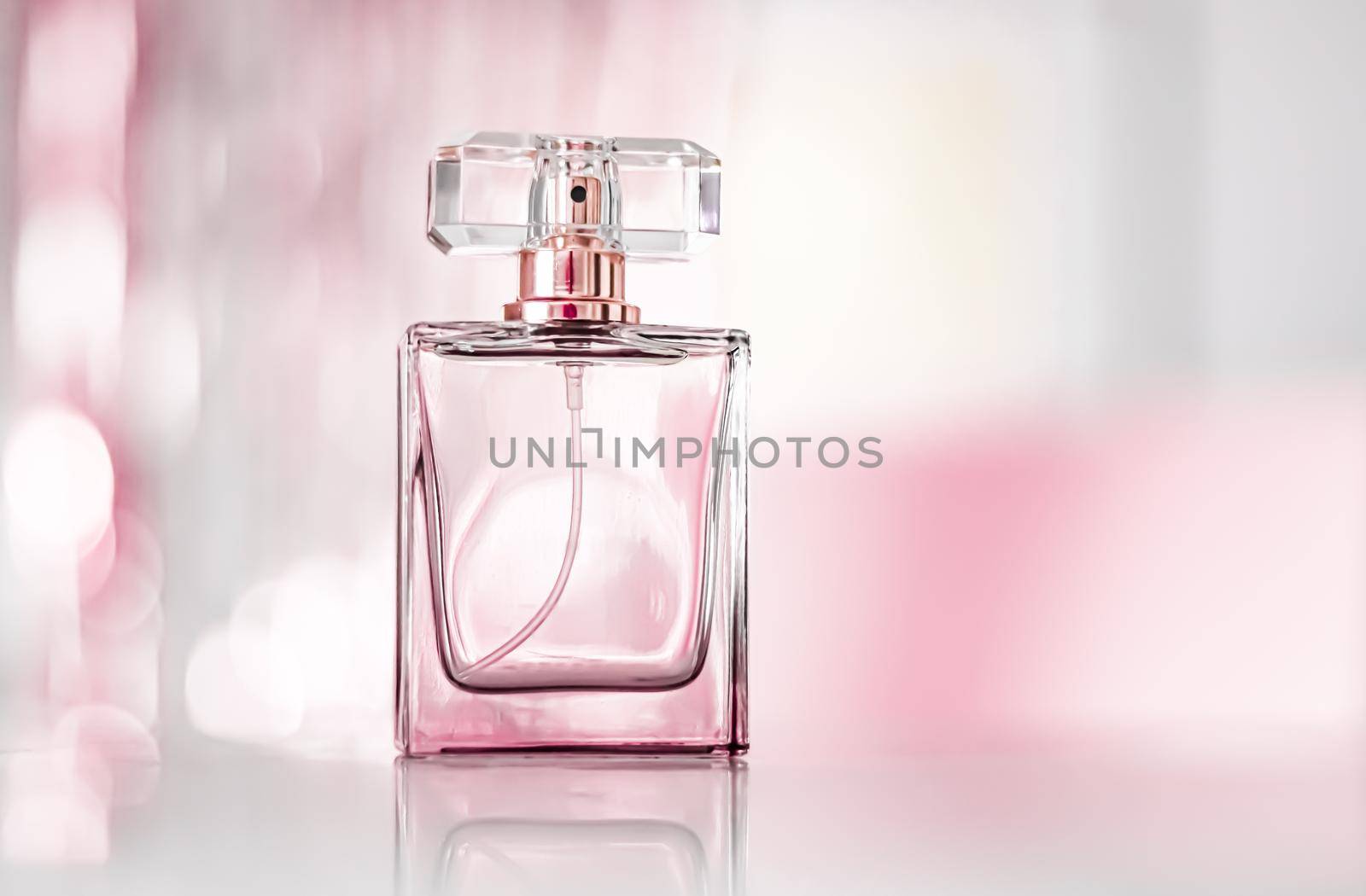 Perfume bottle on glamour background, floral feminine scent, fragrance and eau de parfum as luxury holiday gift, cosmetic and beauty brand present concept