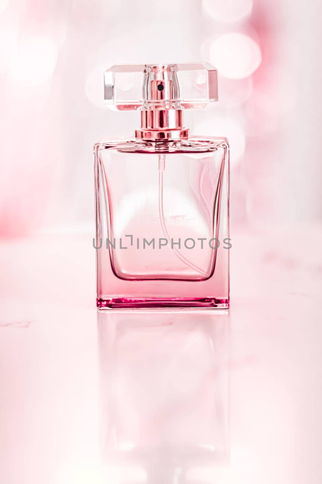 Perfume bottle on glamour background, floral feminine scent, fragrance and eau de parfum as luxury holiday gift, cosmetic and beauty brand present concept