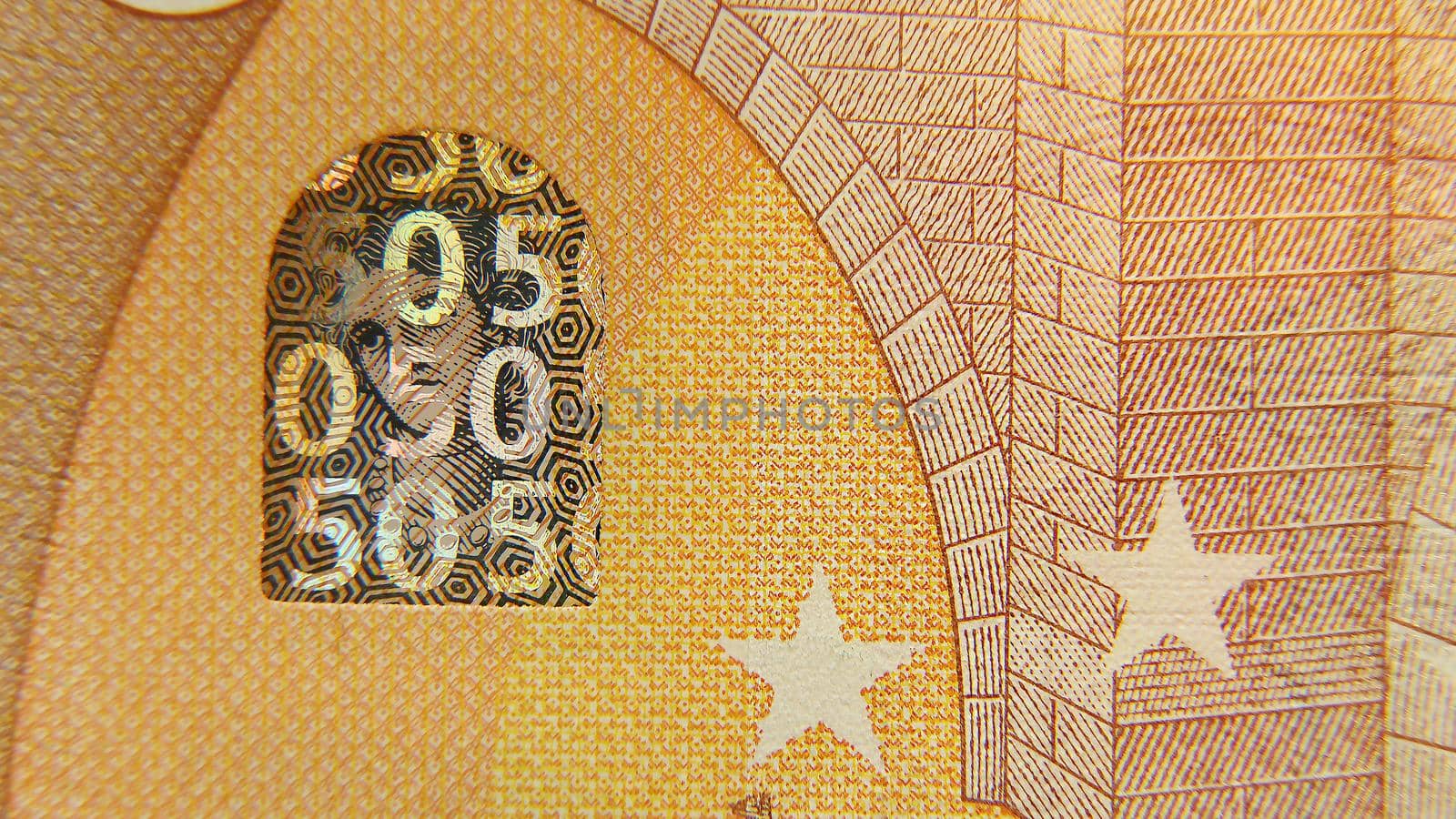 Part of a 50 euro paper bill. Macro photo. Cash. Finance. Without lighting.