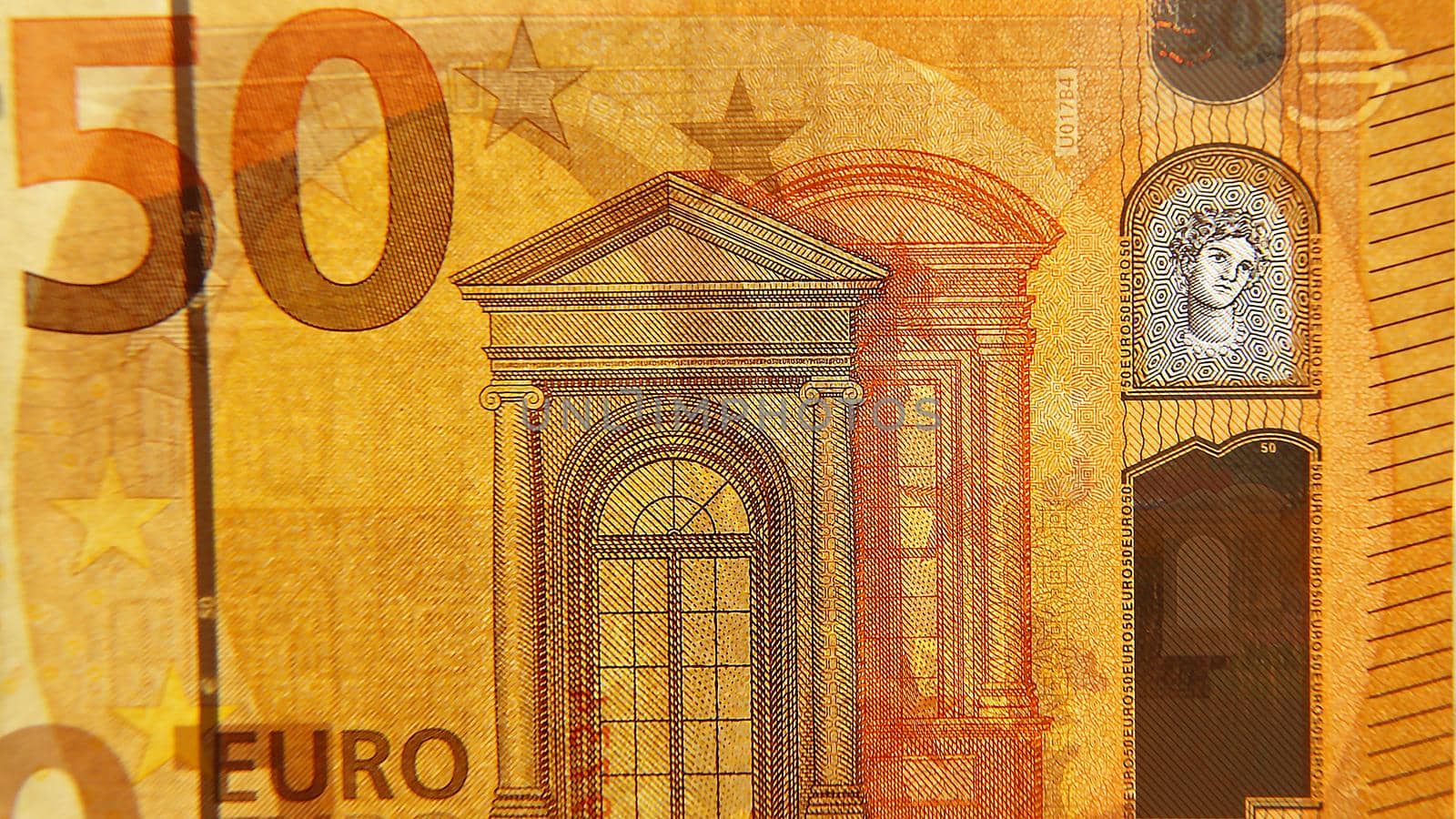 The bill is 50 euros. Macro photo. Water signs. Illumination. Buzhnaye money. Cash.