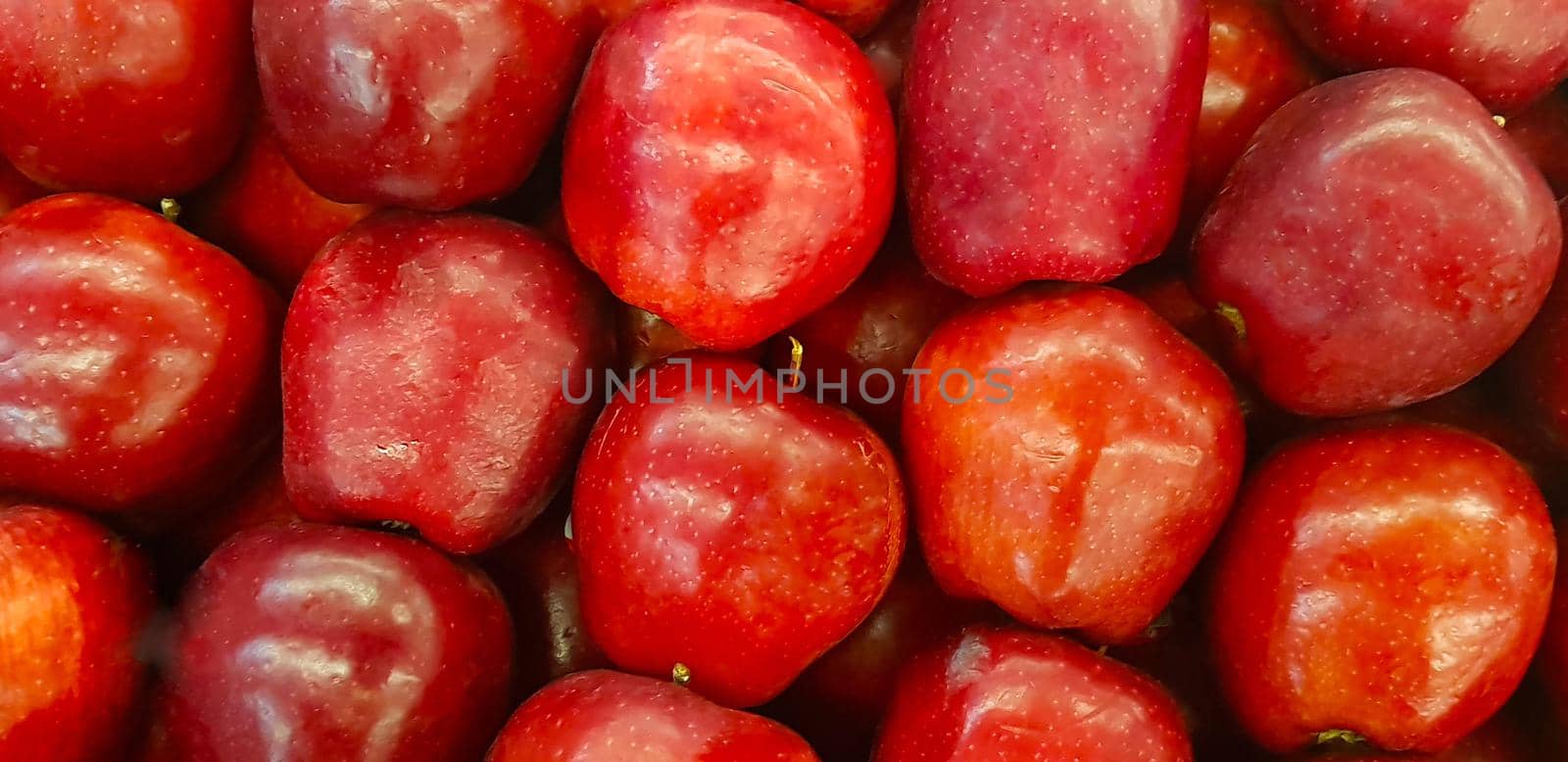Fresh red apples good for multimedia and content background group of red ripe apples