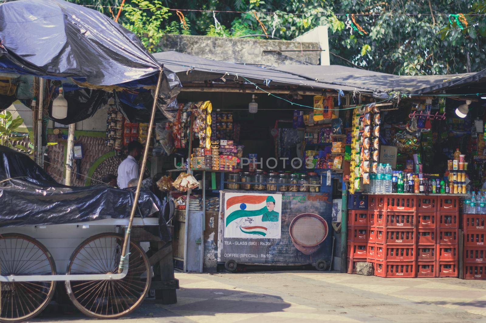 A small street food stall on the corner of a road. Kolkata India South Asia 17 August 2022