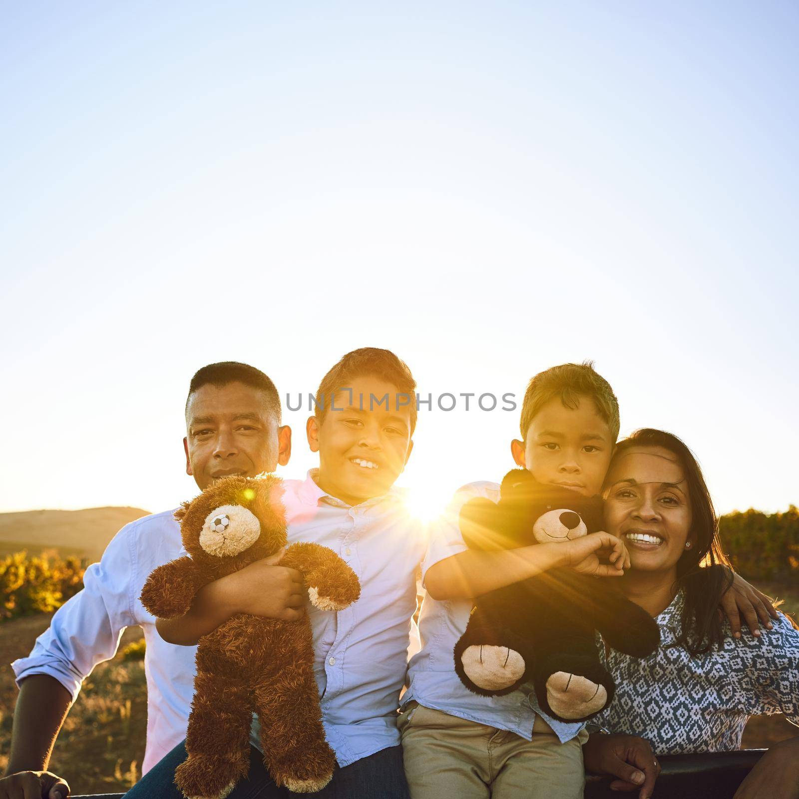 Being together is such a treasure. Portrait of a happy family bonding together outdoors