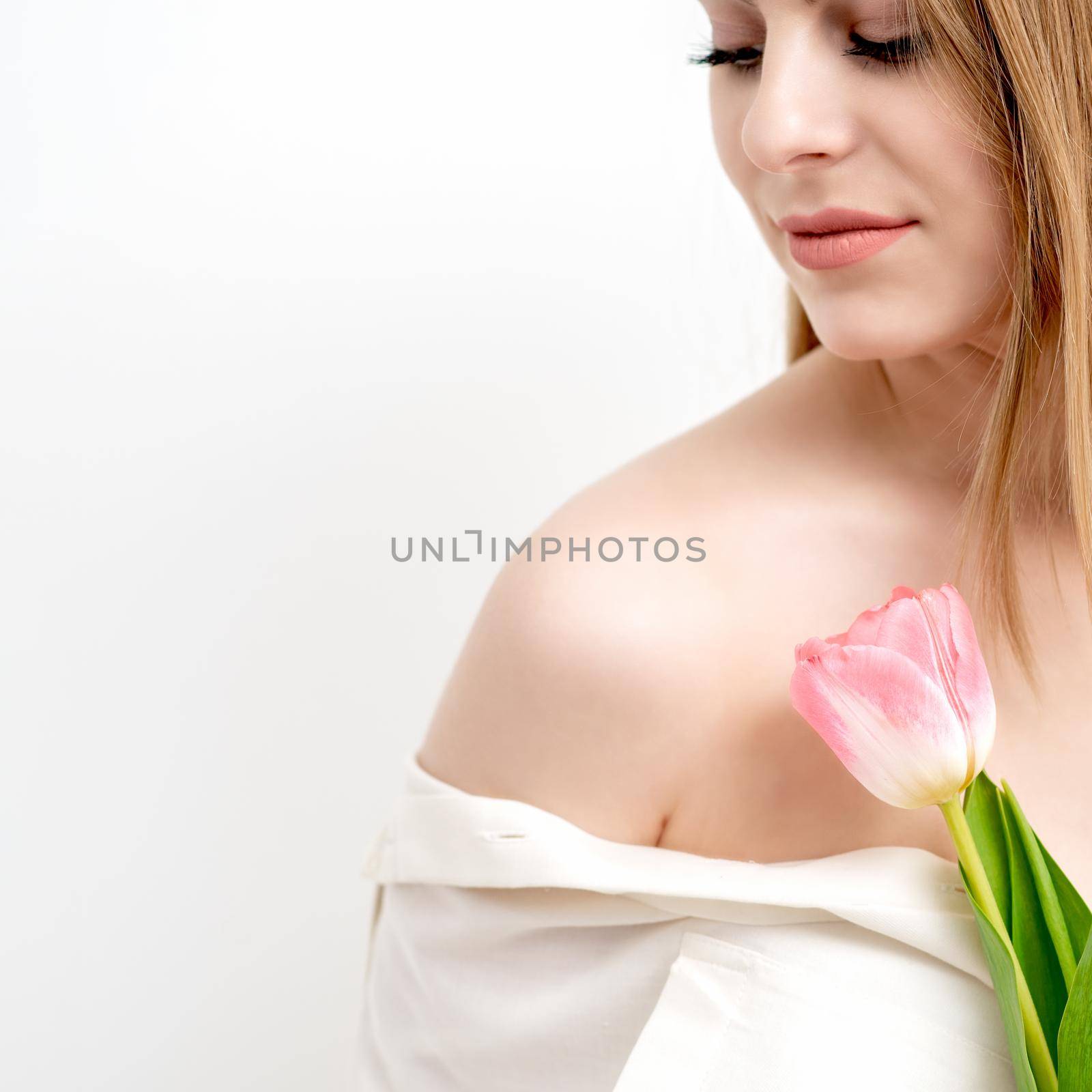 Woman with one pink tulip by okskukuruza