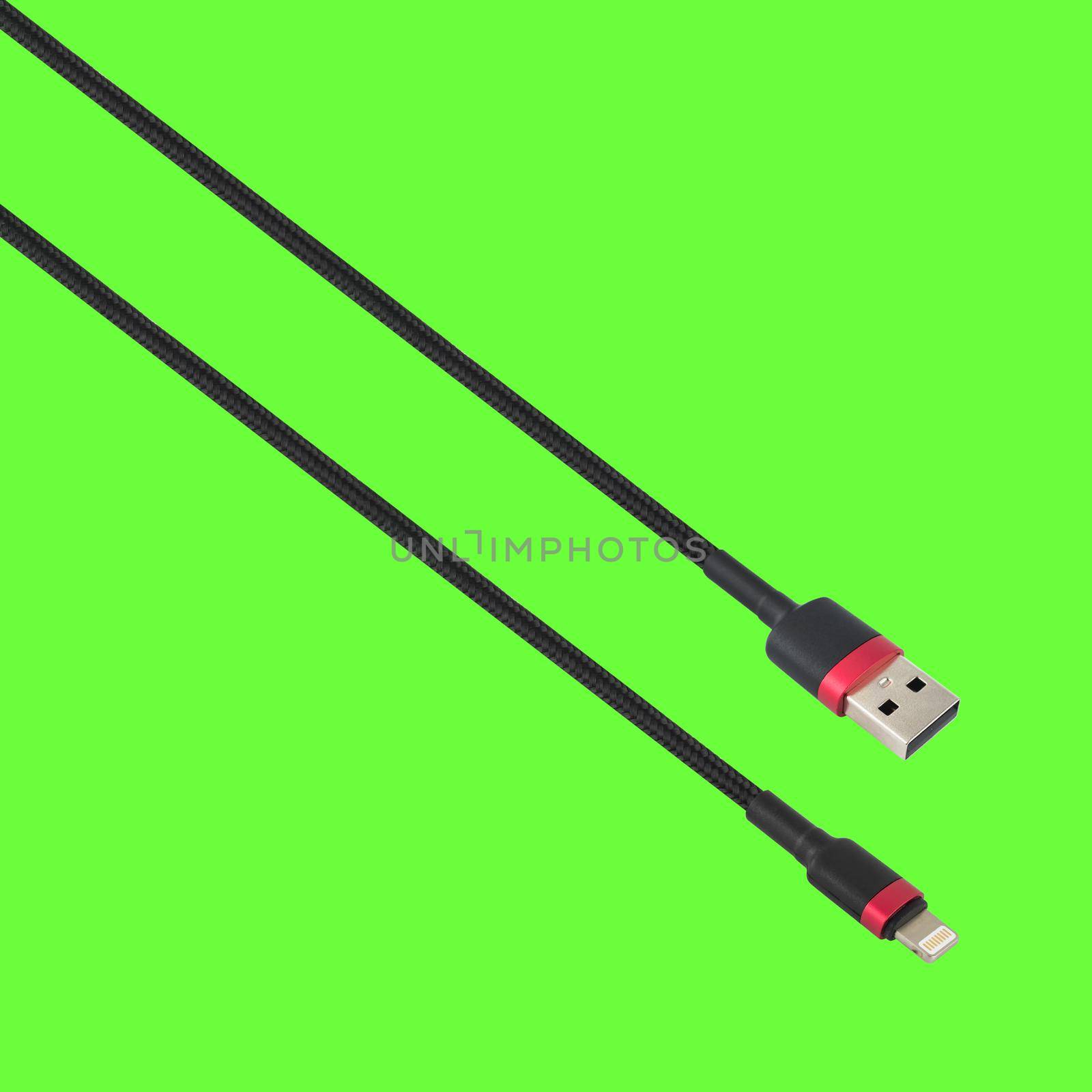 Cable with USB and Lightning connector, on a green background by A_A