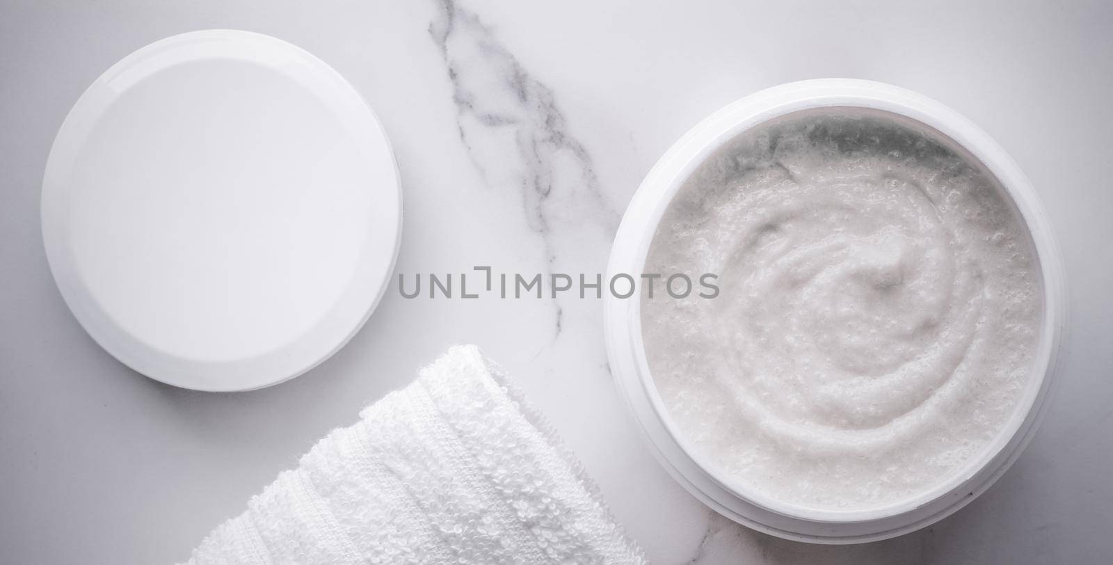 Skincare and body care, luxury spa and clean cosmetic concept. Health and beauty of your skin - Scrub and exfoliating cream products on a marble, flatlay