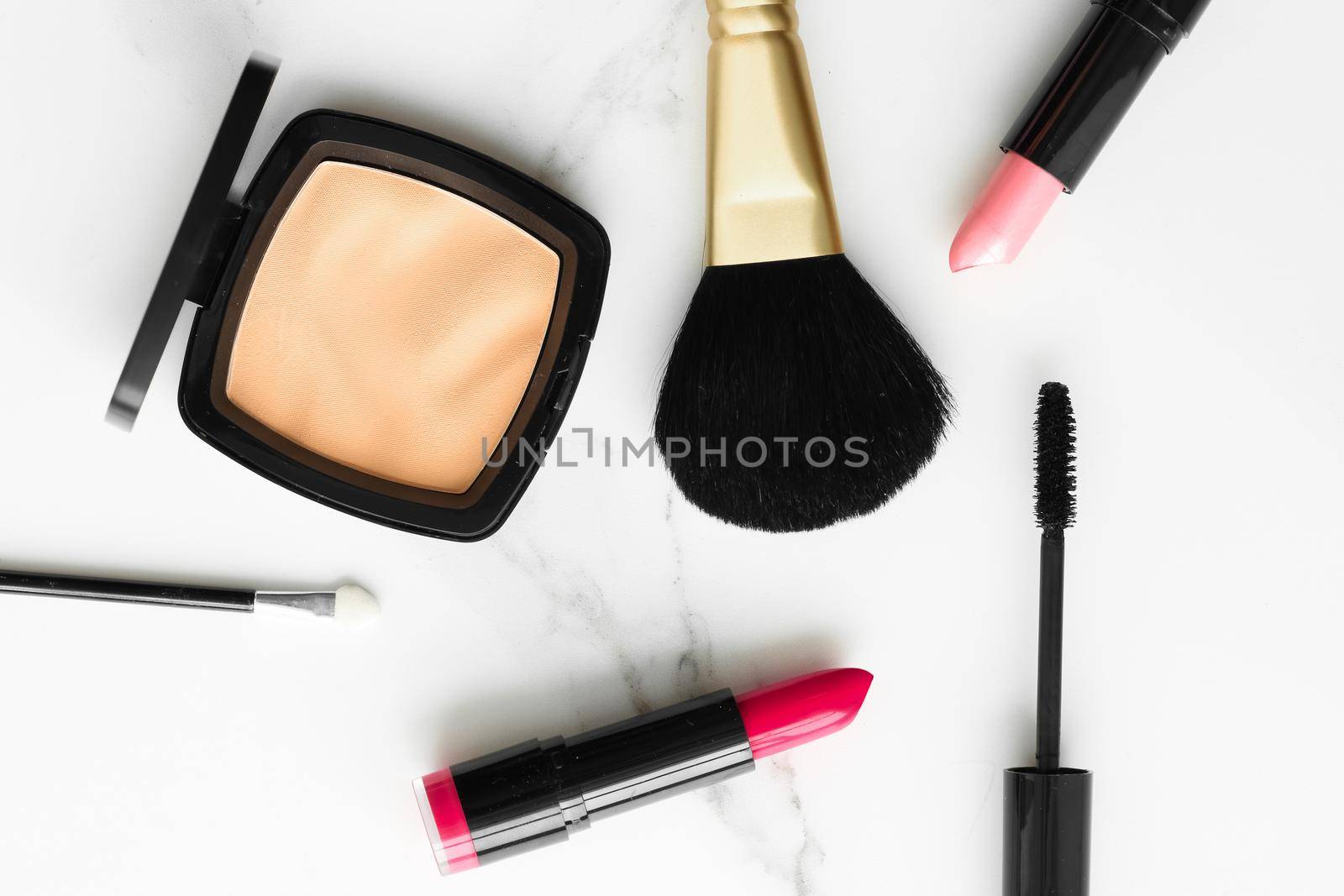 Make-up and cosmetics on marble, flatlay - modern feminine lifestyle, vlog background and styled stock concept. Beauty inspiration in a fashion blog