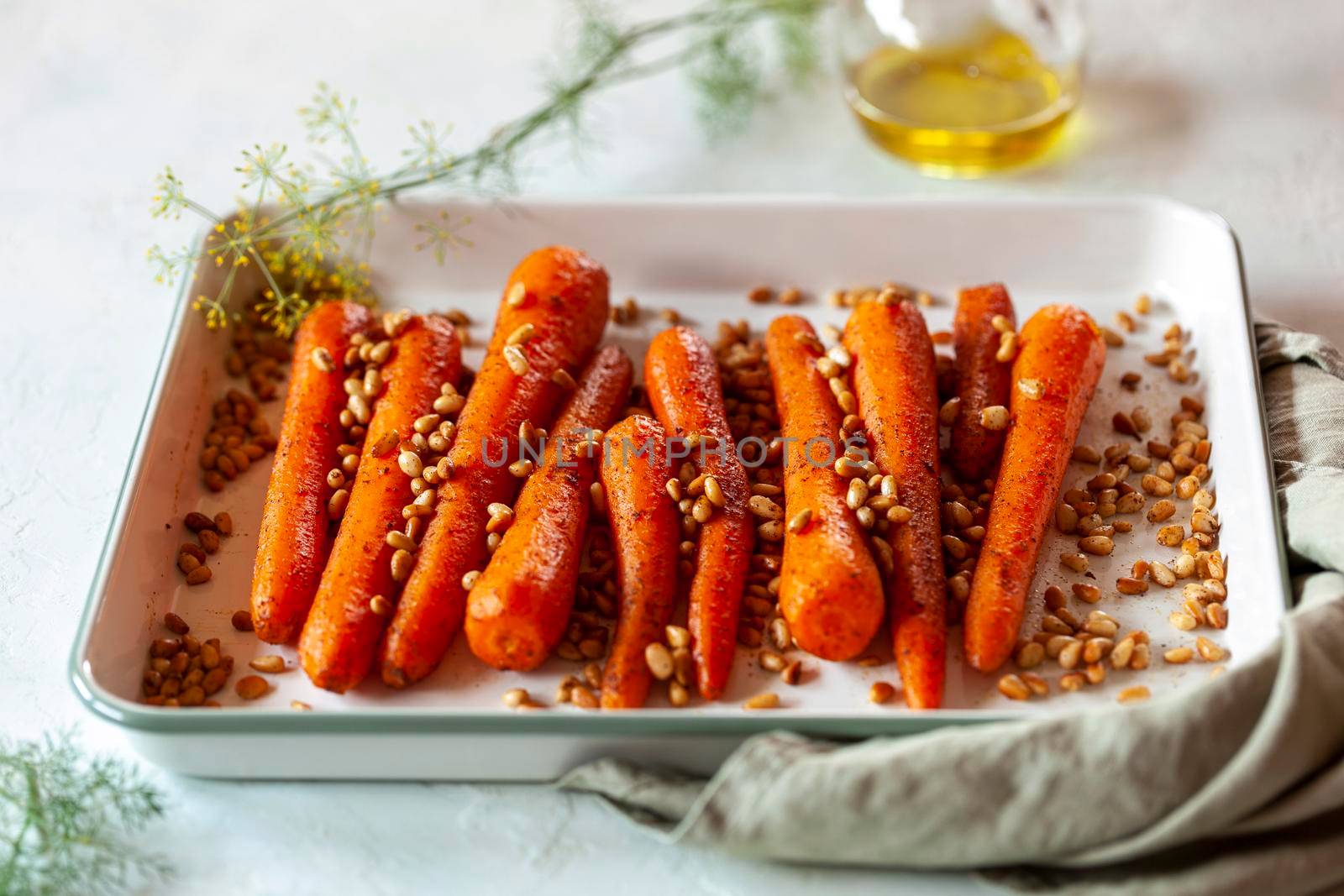Lebanese-style carrots prepared with pine nuts and cumin, side view