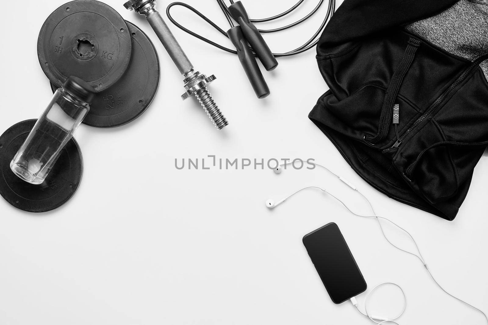 Top view of Sport stuff on white background. Fitness lifestyle concept. Free space for text. Flat lay. Copy space