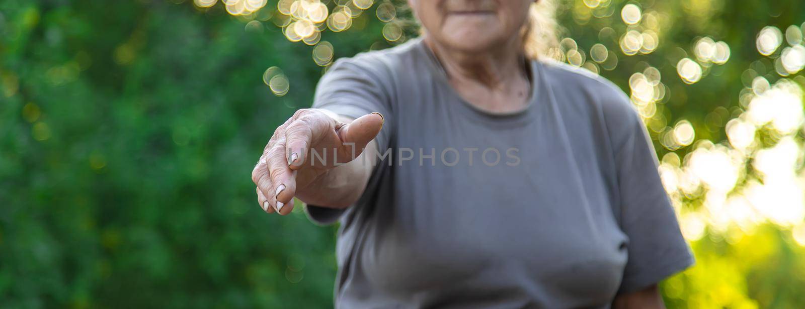 grandmother lends a helping hand. Selective focus. people.