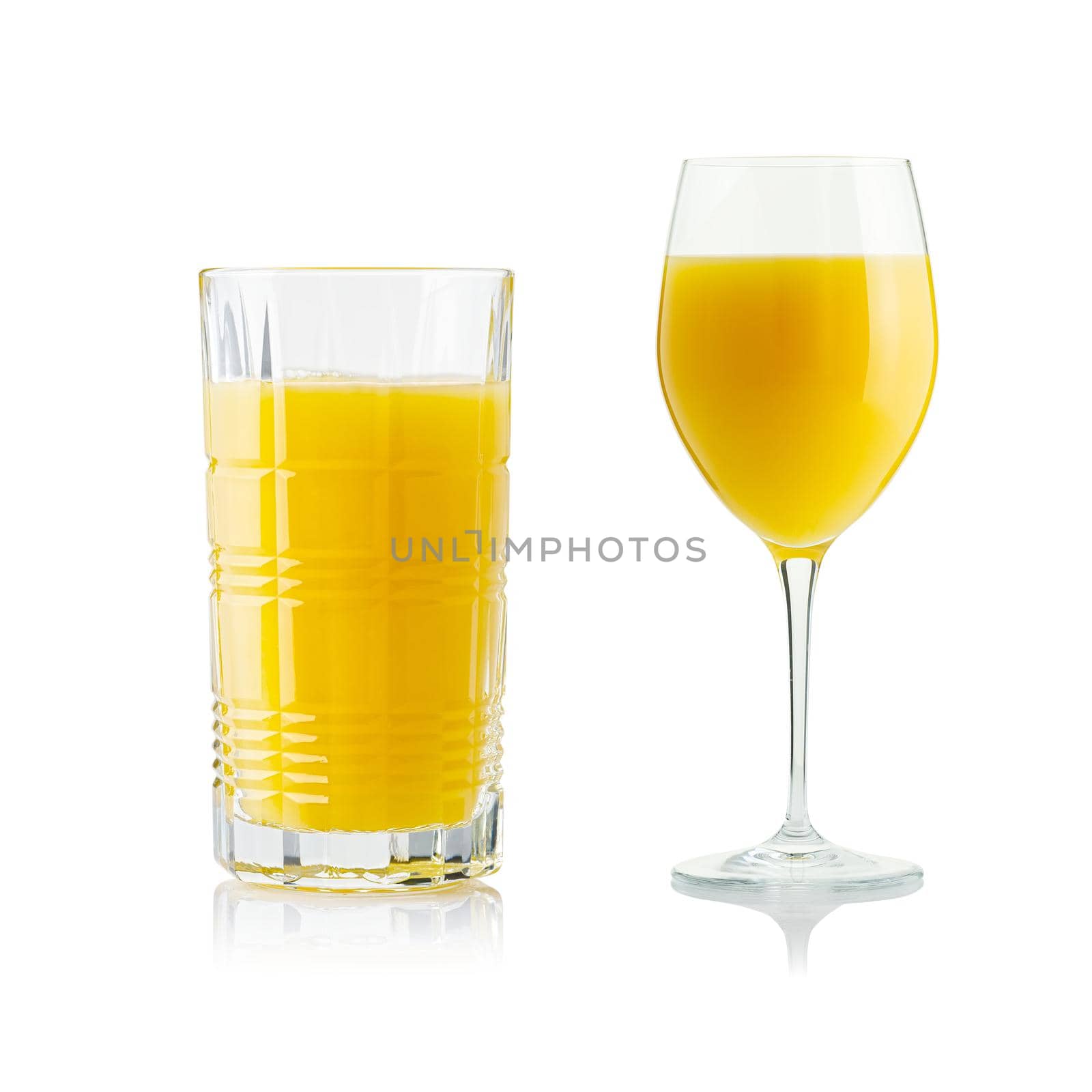 Collection of orange juice in different glasses . eparate clipping paths for each glass. Set of glasses with tropical orange juice